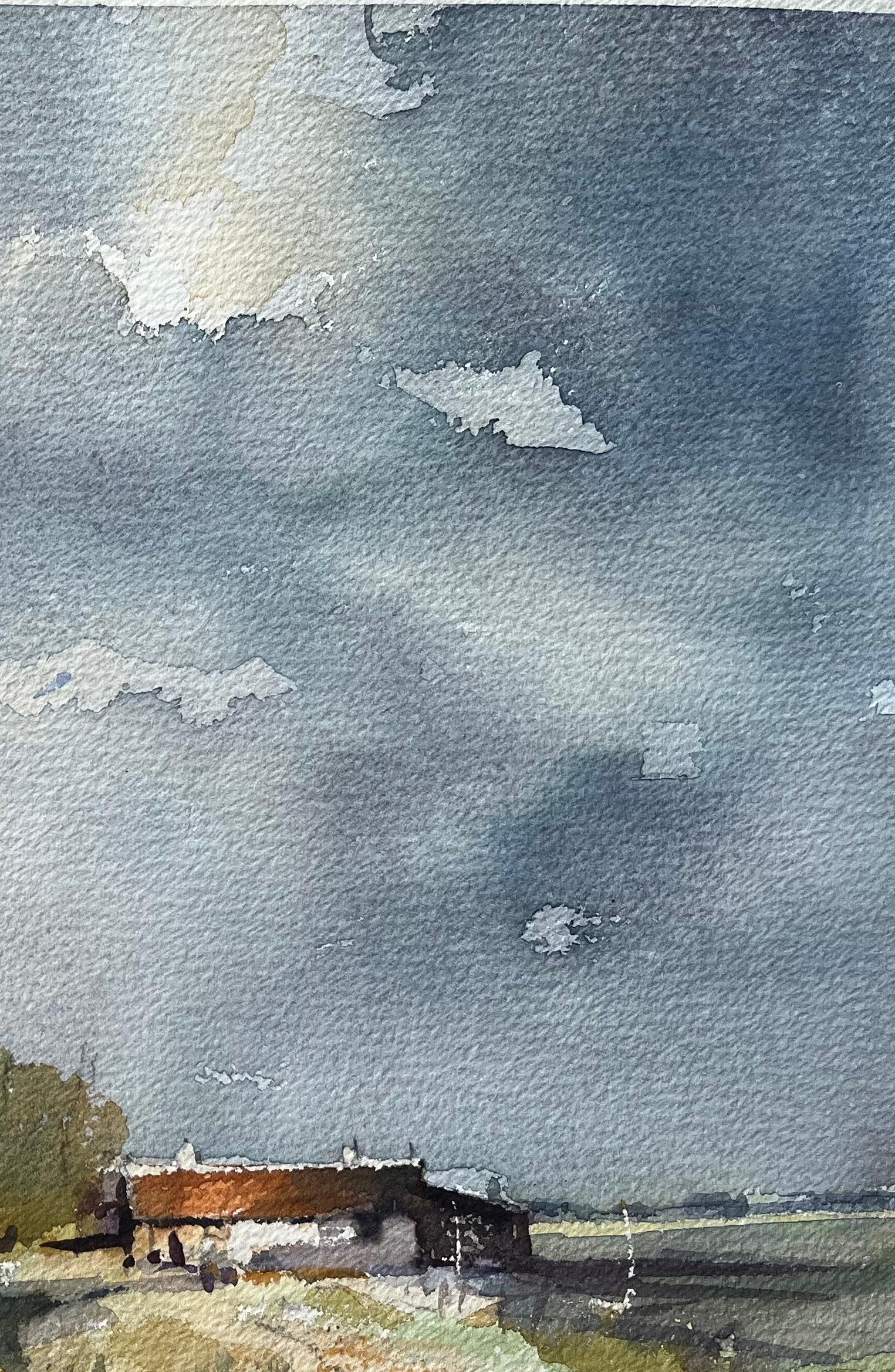 Titel: Britischer Impressionist Aquarell einer Flussszene mit dramatischem Himmel
Von Anthony Avery (Brite 1946-2023)
Original-Aquarell auf Künstlerpapier, ungerahmt
Unterschrieben: Ja
Abmessungen: 11 x 15,25 Zoll (Höhe x Breite)
Zustand: Gut, mit
