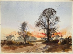 Aquarelle impressionniste britannique d'un coucher de soleil éclatant sur un paysage de campagne