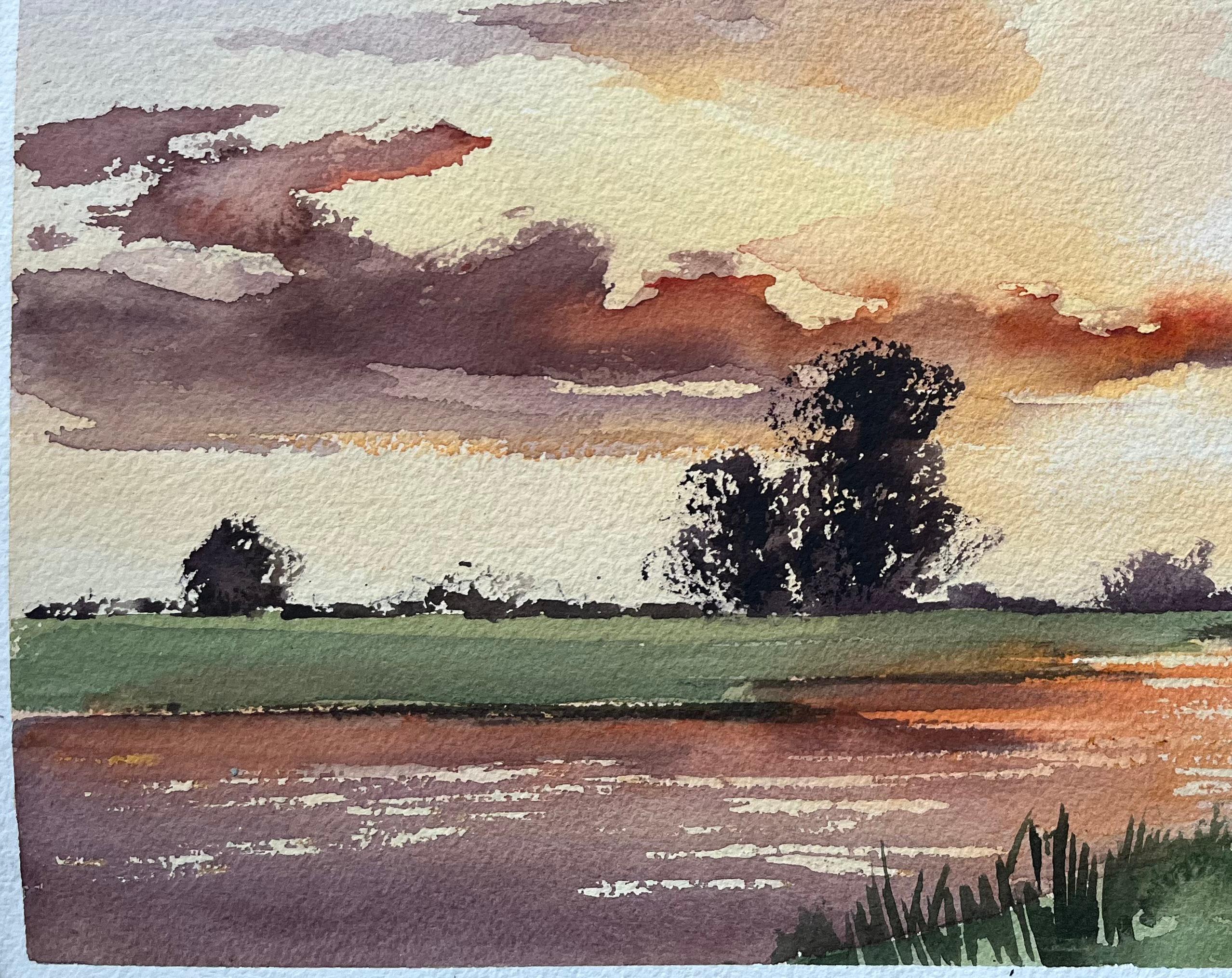 Titre : Aquarelle impressionniste britannique d'un coucher de soleil éclatant sur une campagne paisible
Par Anthony Avery (britannique 1946-2023)
Aquarelle originale sur papier d'artiste, non encadrée
Dimensions : 11.25 x 15.25 pouces (Hauteur x