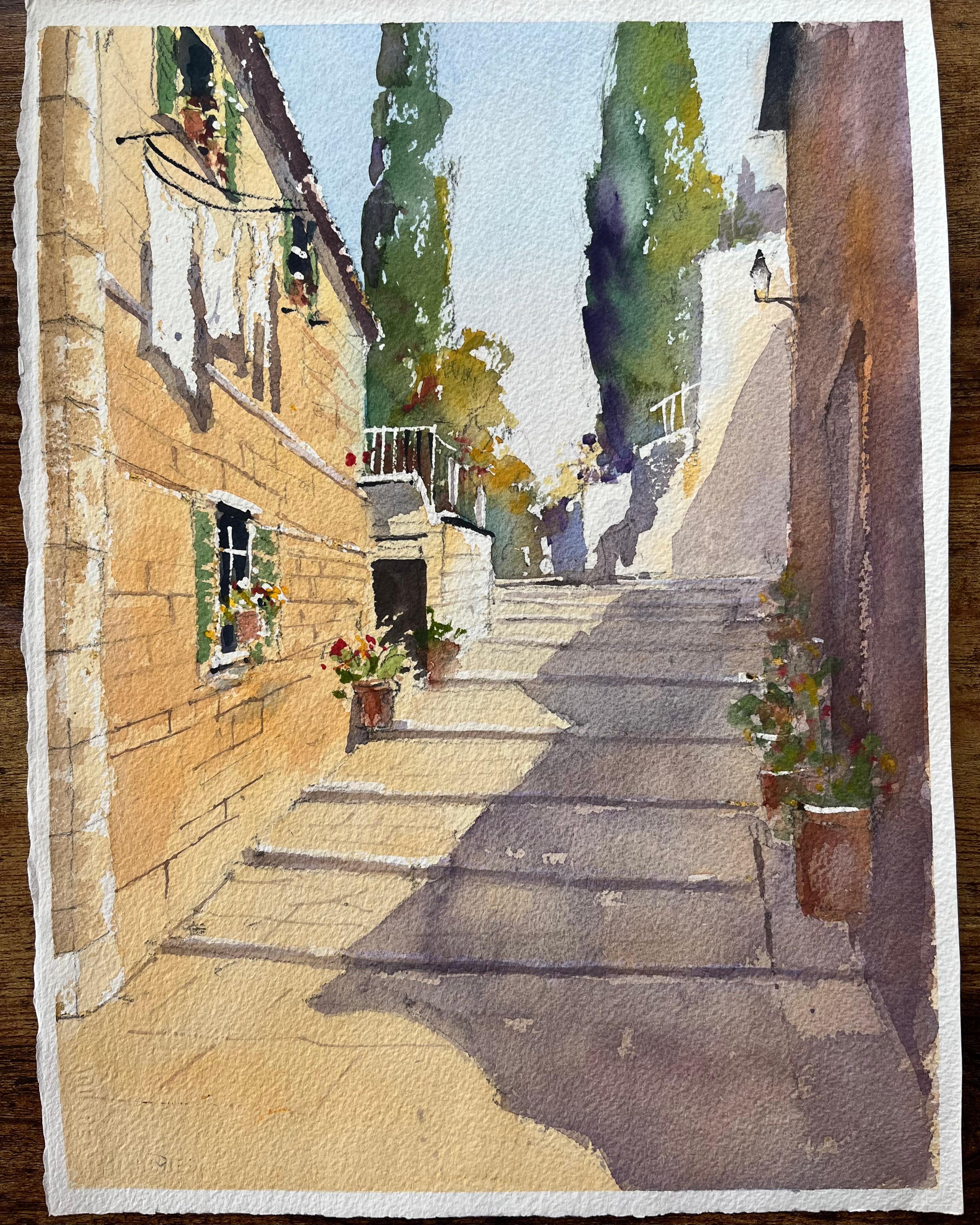 Acuarela impresionista británica de un callejón de piedra iluminado por el sol con cipreses - Painting de Anthony Avery