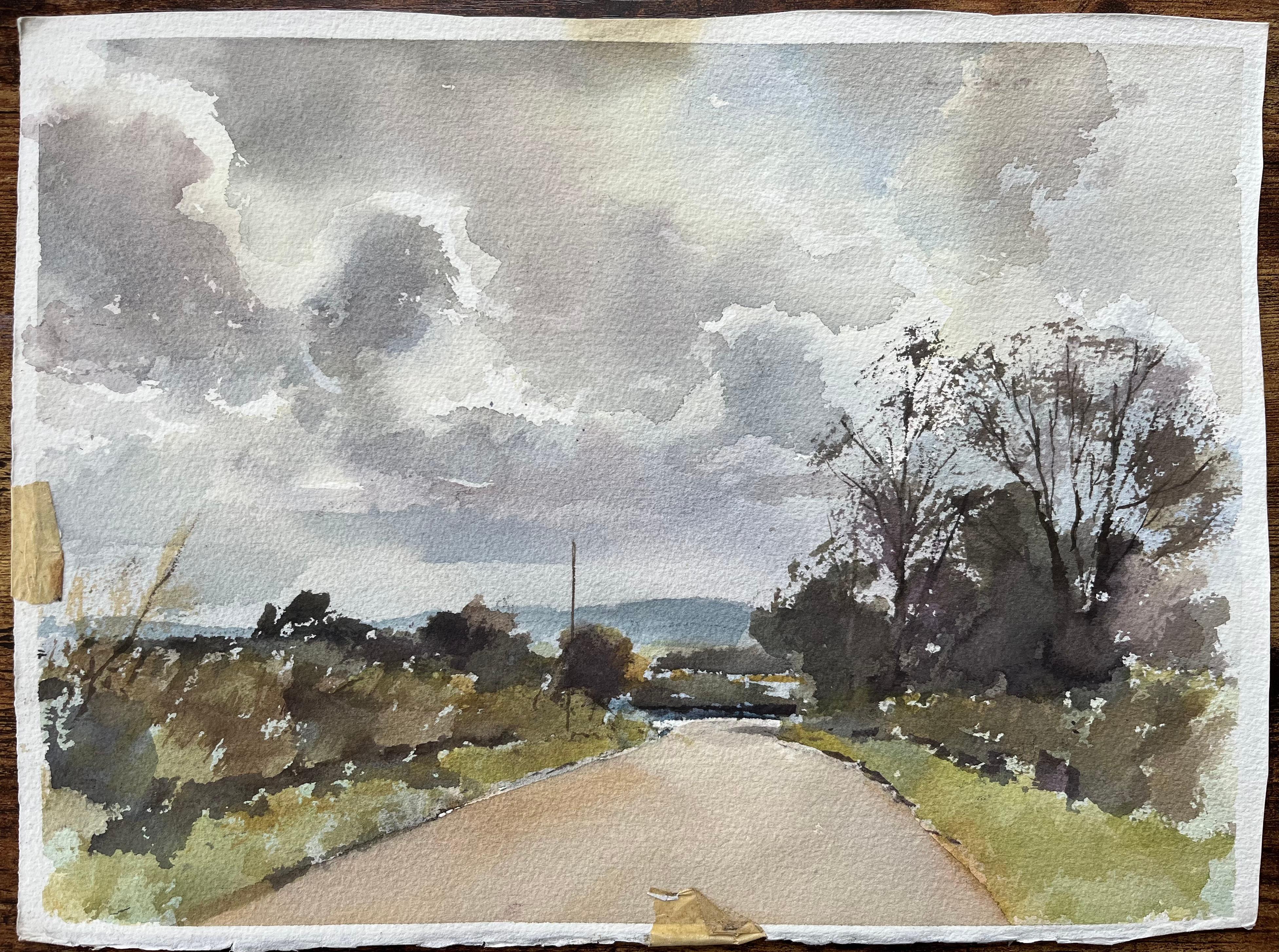 British Watercolor of a Countryside Road Under Dramatic Clouds - Painting by Anthony Avery