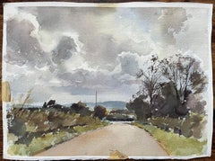 British Watercolor of a Countryside Road Under Dramatic Clouds