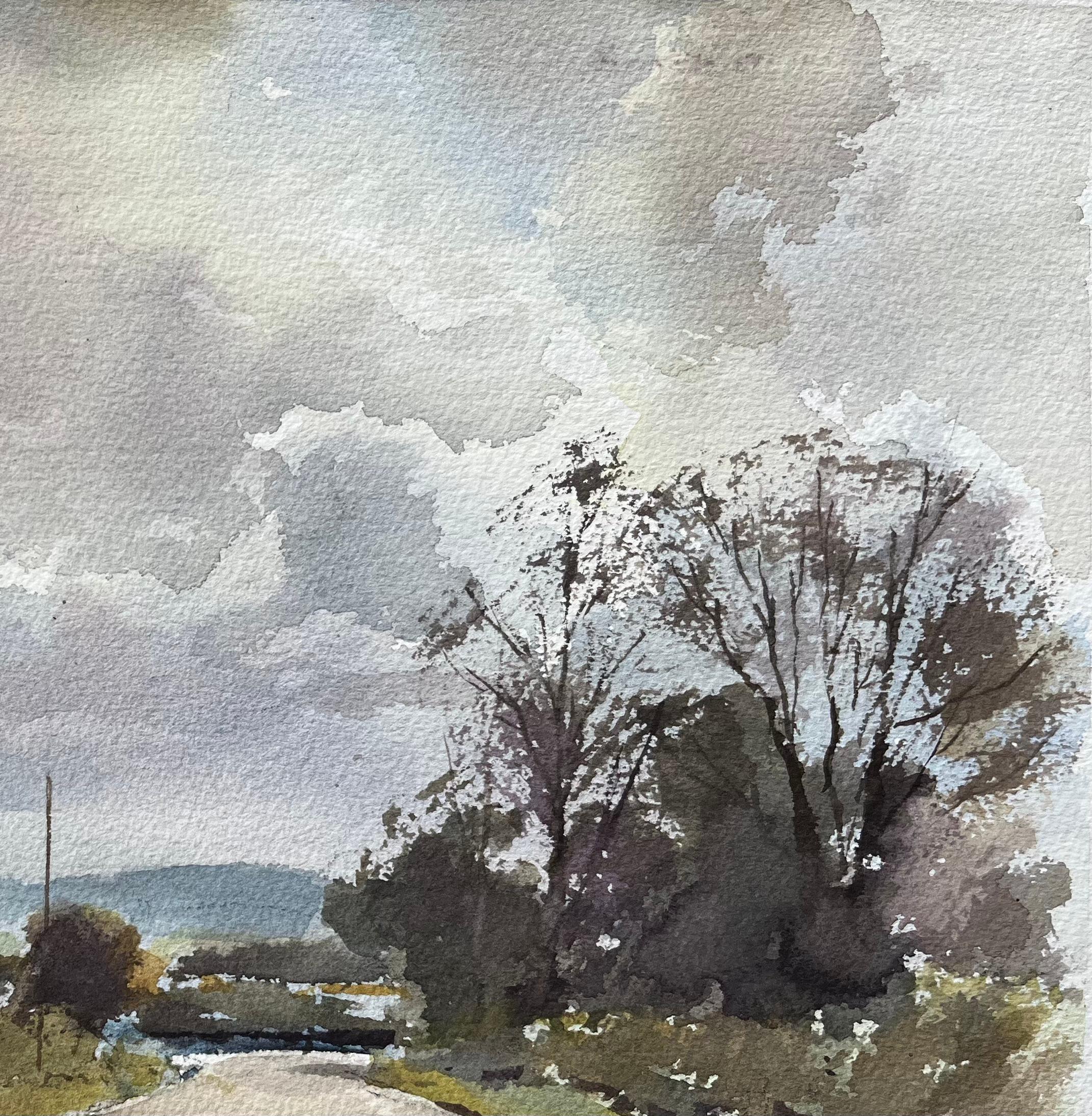 British Watercolor of a Countryside Road Under Dramatic Clouds - Gray Landscape Painting by Anthony Avery