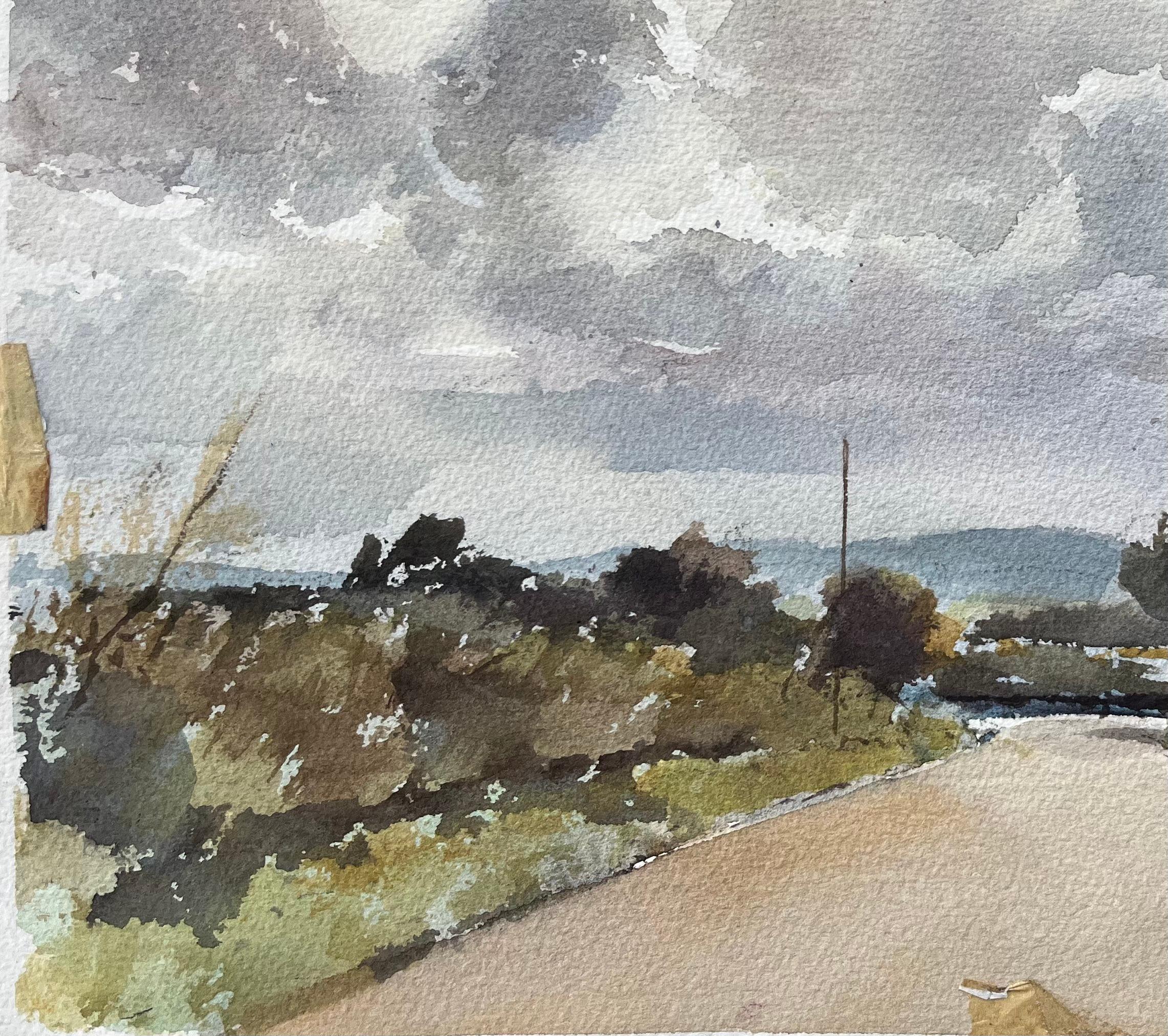 Title: British Watercolor of a Countryside Road Under Dramatic Clouds
By Anthony Avery (British 1946-2023)
Original watercolor on artists paper, unframed
Dimensions: 11.25 x 15.25 inches (Height x Width)
Condition: Good, with some minor signs of