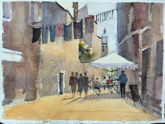 British Watercolor of a Street Scene with Hanging Laundry and Outdoor Café