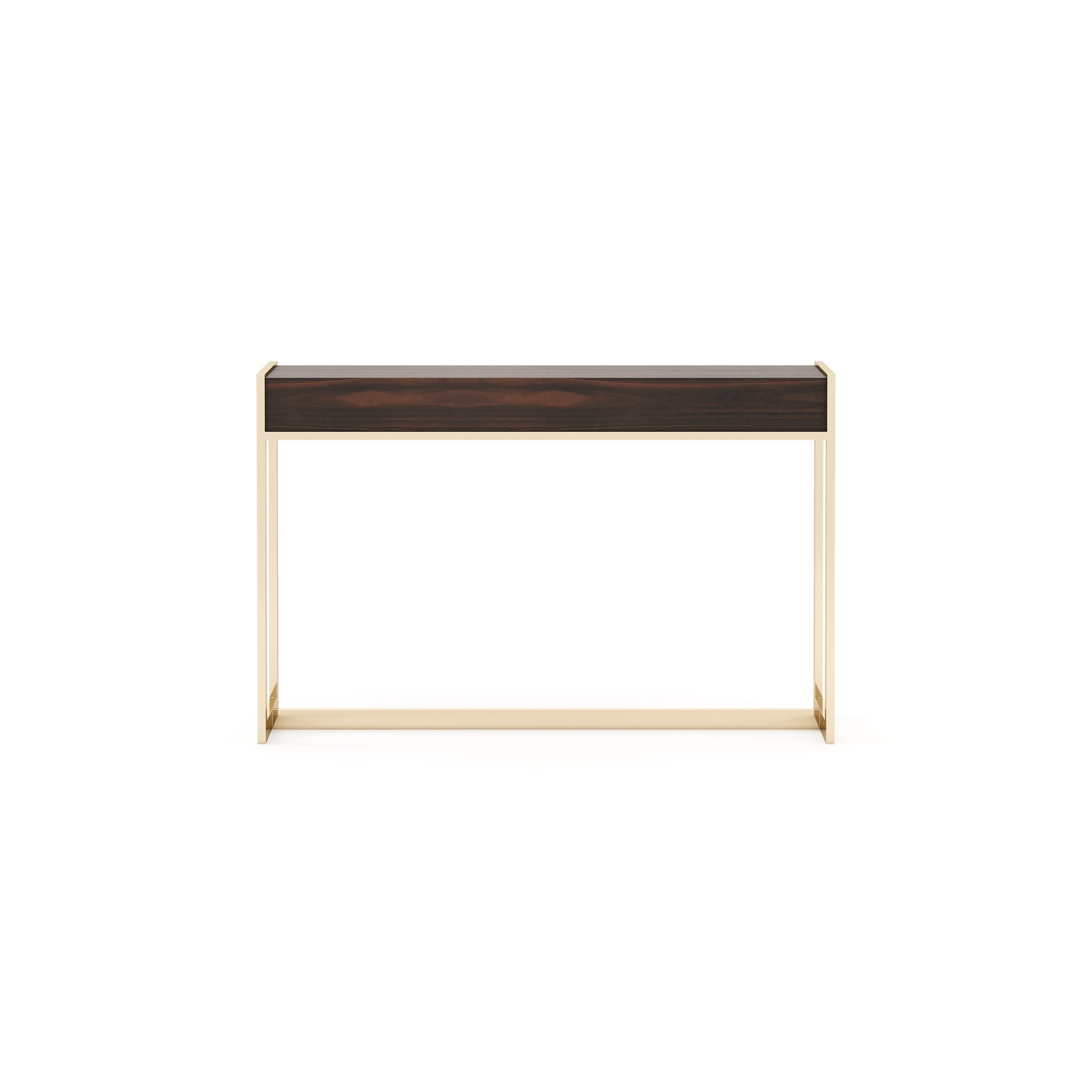 Anthony console is an impressive piece made with a wood top and complemented by gold stainless steel. The audacious top is a nice contrast to the shape of thin and rectangular feet. This is a must-have piece for living rooms and entrance halls.

*