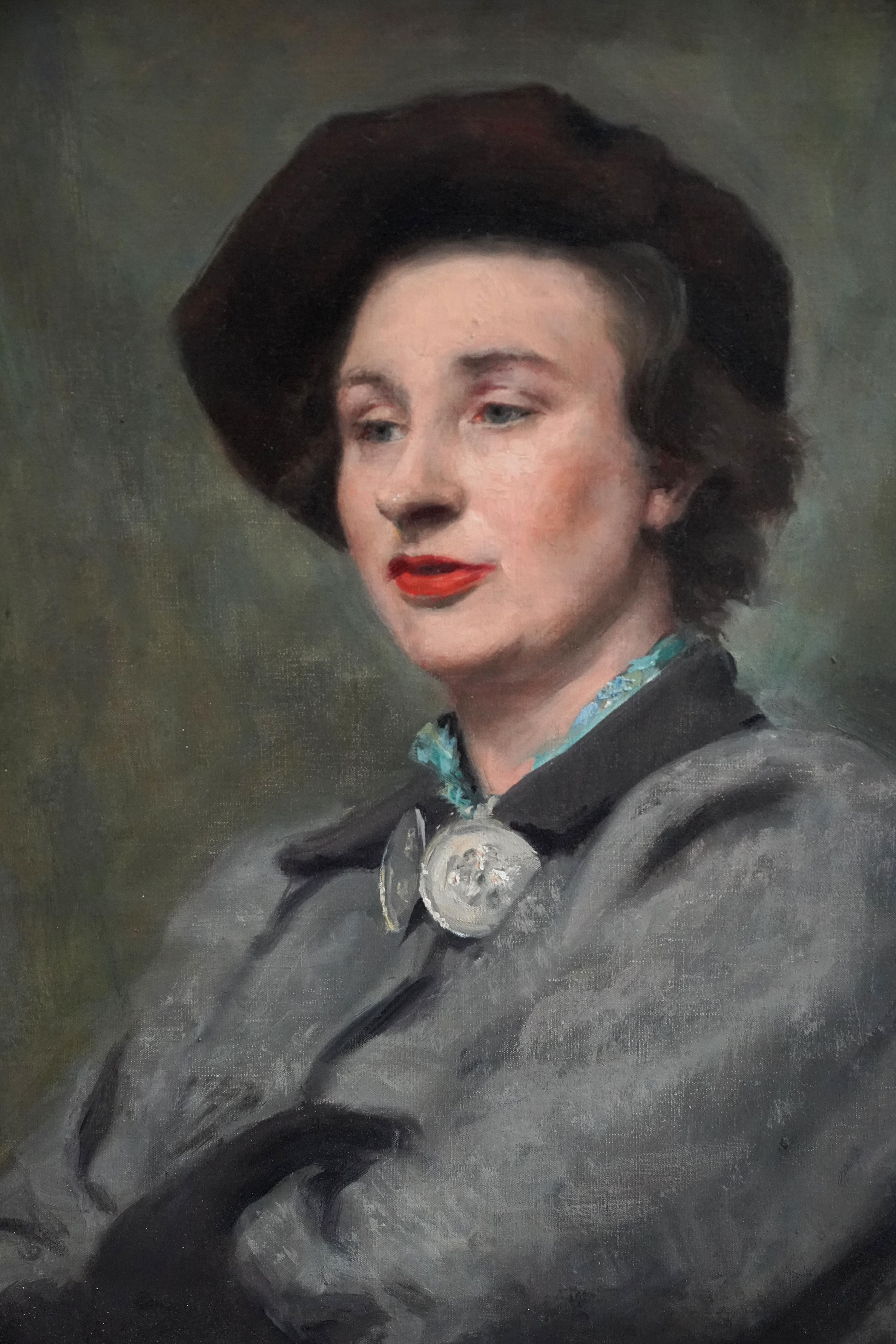 This striking British Post-Impressionist portrait oil painting is by noted artist Anthony Devas. Painted in the 1950's the sitter is Fiona Benkiston of Heskham Square. She is wearing a black hat, grey coat and bold red lipstick. A very evocative