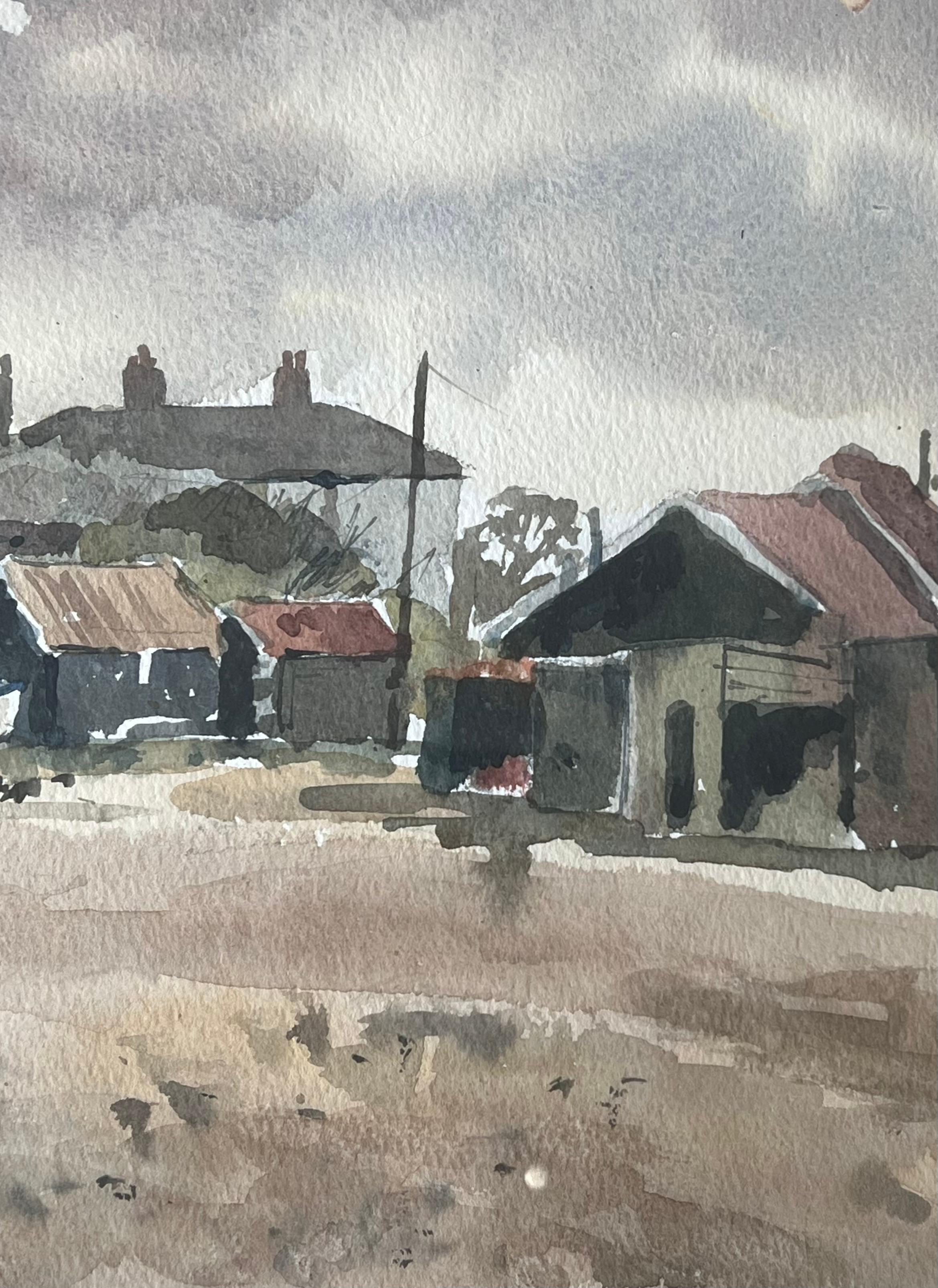 Boats Docked on Shore By Weathered Wooden Sheds with Rusted Roofs Watercolour For Sale 1