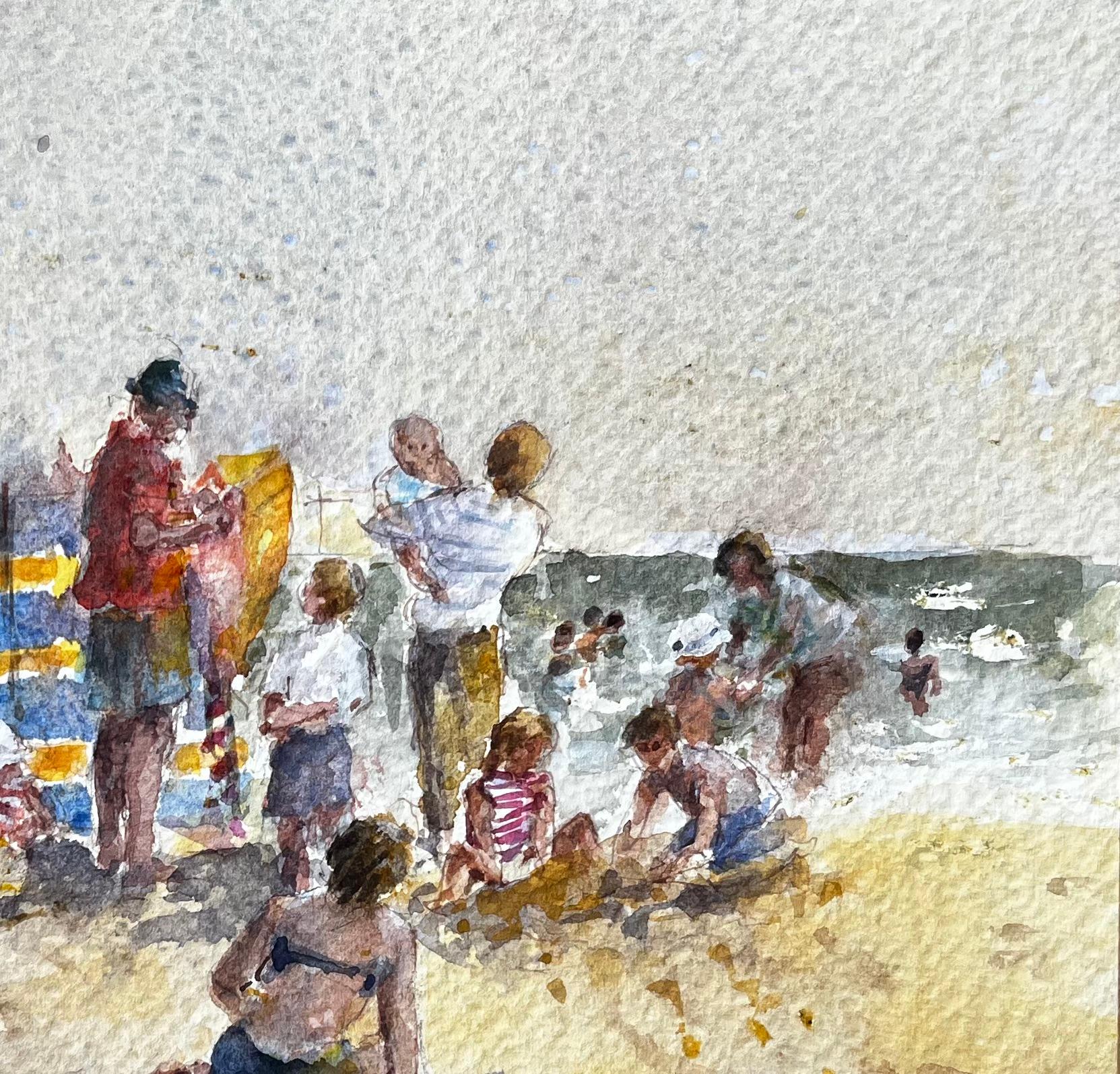 British Seaside Family Beach Scene with Windbreak and Umbrella by Tony Herbert - Gray Landscape Art by Anthony Herbert