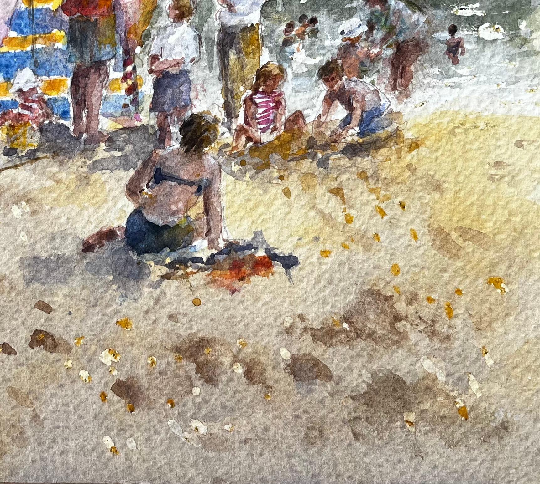 Title: British Seaside Family Beach Scene with Windbreak and Umbrella by Tony Herbert
By Tony Herbert (1927-2024)
Signed: Botton left
Medium: Watercolor on artists paper
Size: 10 x 11.25 inches 
Condition: Good overall; minor corner wear and subtle