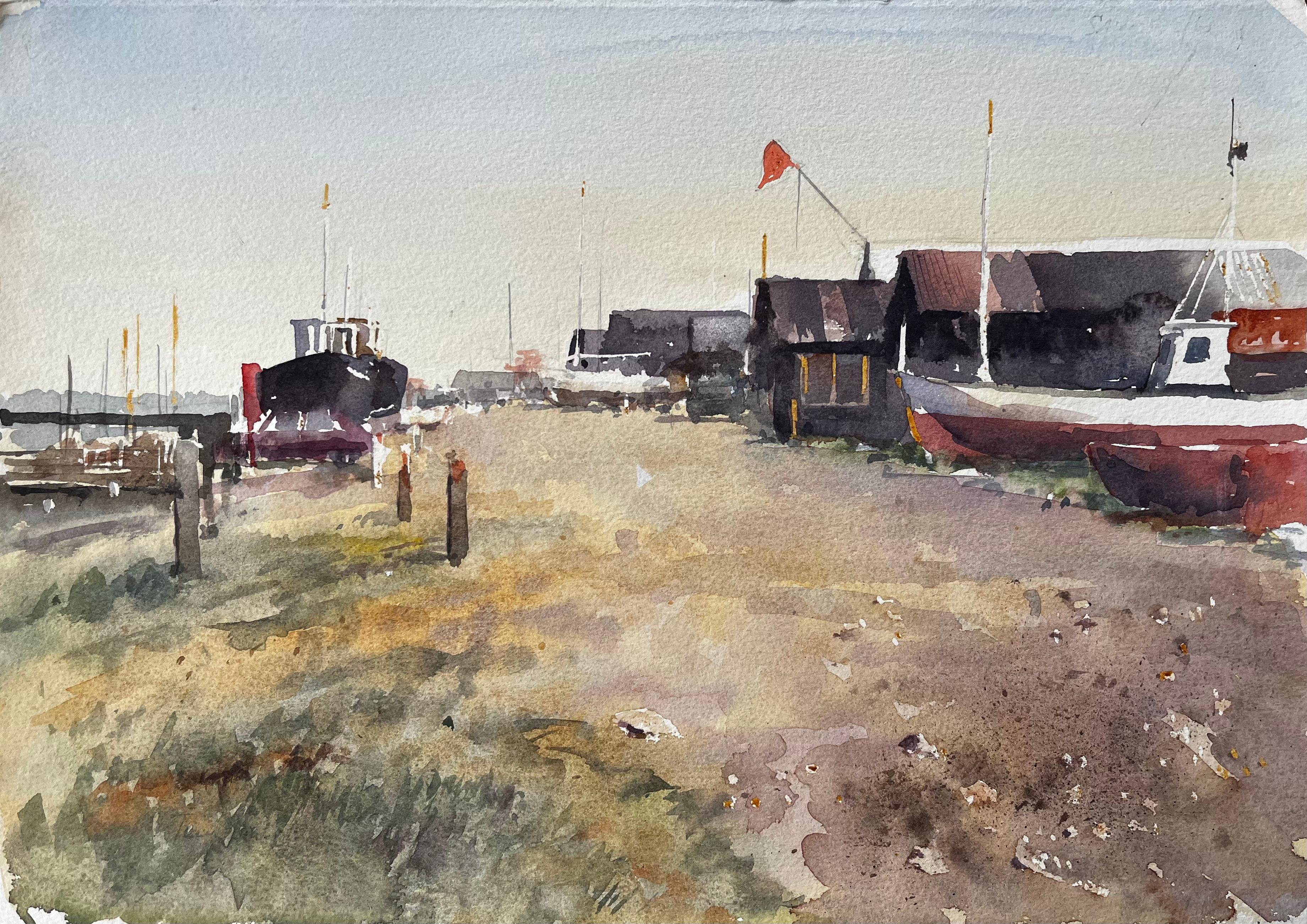 Coastal Boatyard with Fishing Huts Beached Boats and Red Flag Watercolour Scene