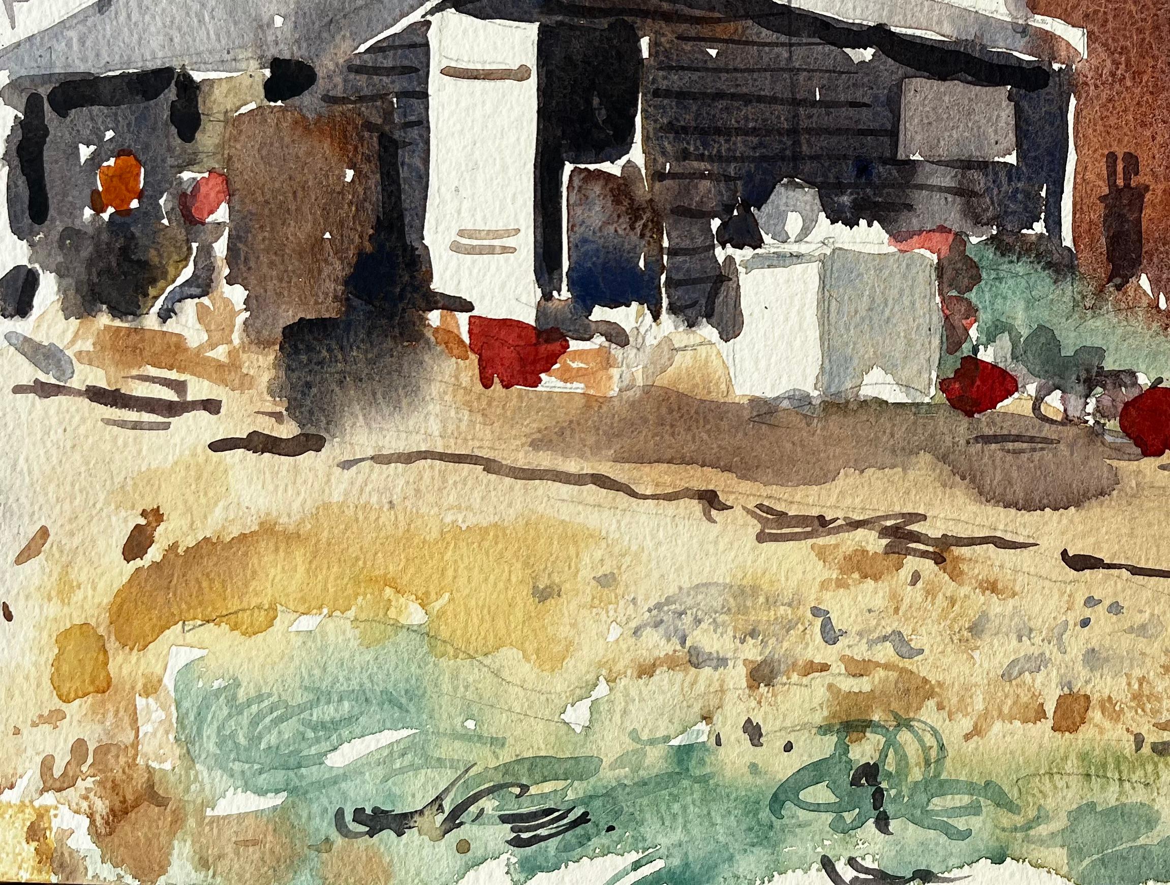 Cabanes de pêche côtières avec filets et débris portuaires Paysage aquarellé en vente 1