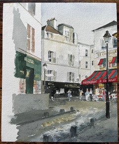 Paris Street Scene With Le Consulat Café And Classic Montmartre Architecture