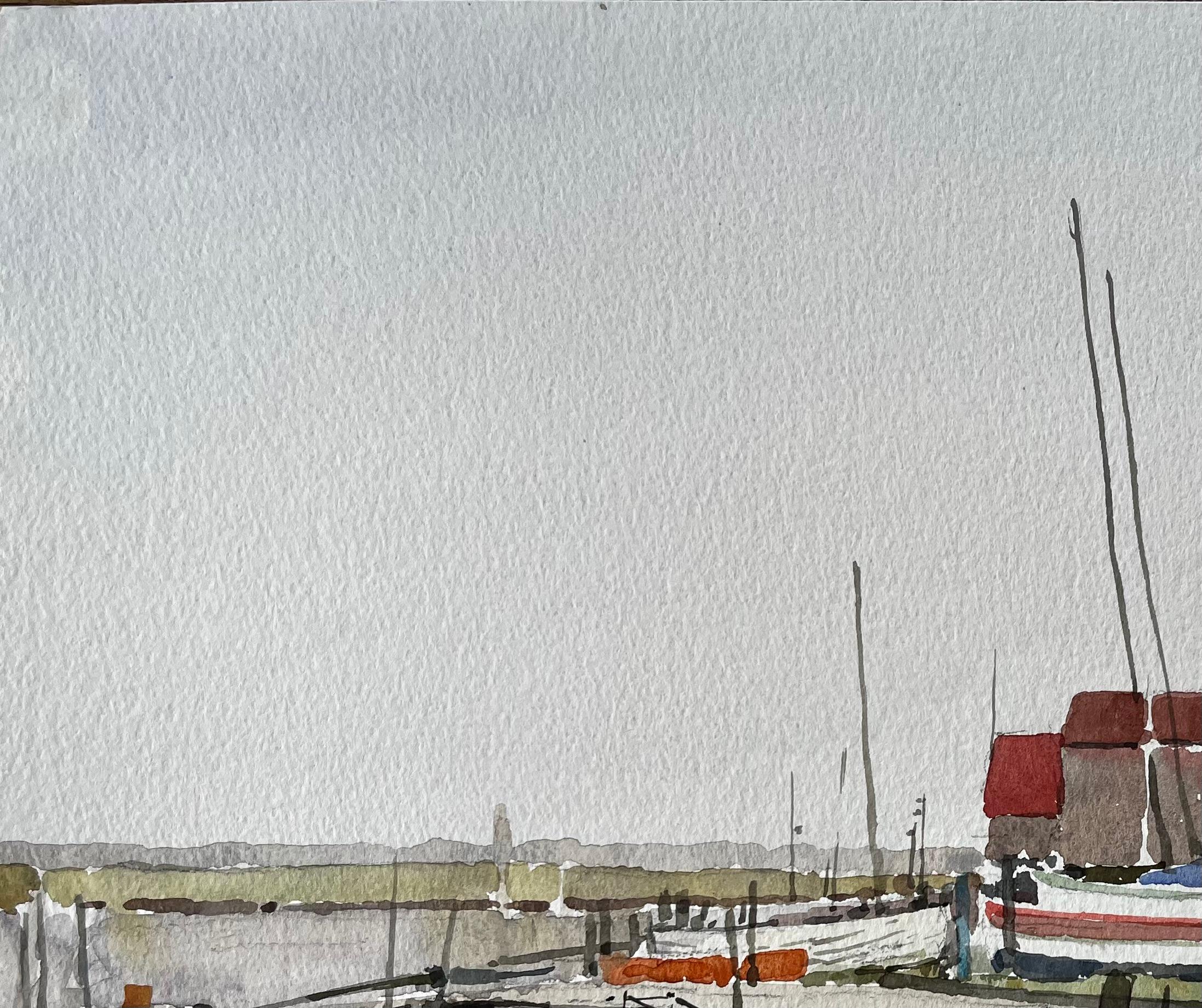 Titre : Bateaux et hangars à bateaux du port de Southwold avec la jetée et les vasières de l'estuaire 1992
Par Tony Herbert (1927-2024)
Signé : En bas à droite
Moyen d'expression : Aquarelle sur papier d'artiste
Taille : 11 x 15 pouces 
Condit : Bon