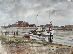 Southwold Harbour Fischerboot Niedrigwasser Mündungsszene mit Schuppen und Liegeplätzen