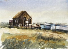 Weathered Coastal Boathouse with Fishing Boats and Dunes Watercolour Painting