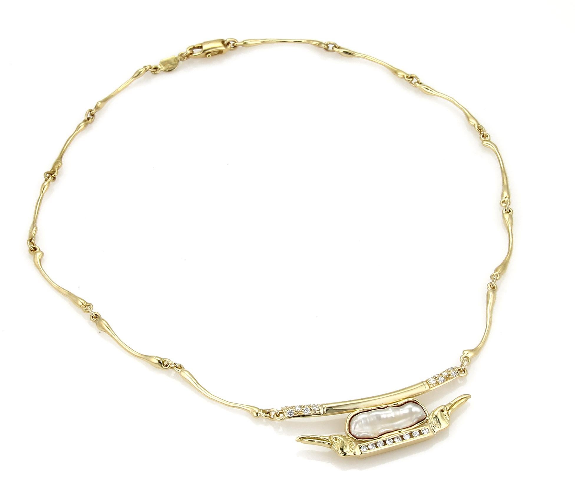 This is a lovely designer Anthony Kim necklace is crafted from solid 18k yellow gold with a polished finish. The pendant features a long curved bar with diamonds on each end, just above the bar is a long freshwater pearl in a basin like gold frame