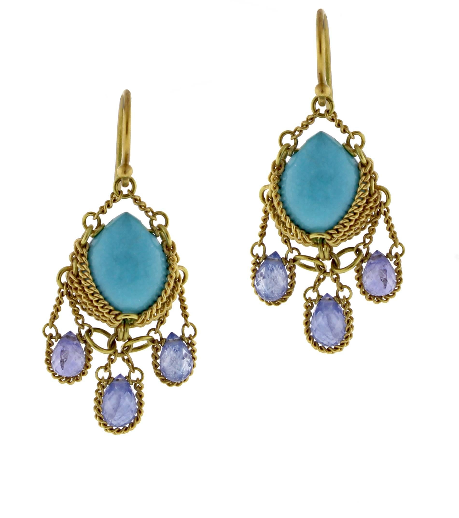 From World-famous jewelry designers Anthony Camargo and Nak Armstrong, these handmade Turquoise and iolite  drop earrings. The 18 karat earrings contain center pear-shape turquoise and iolite roundels. 7/8 of an inch drop  
