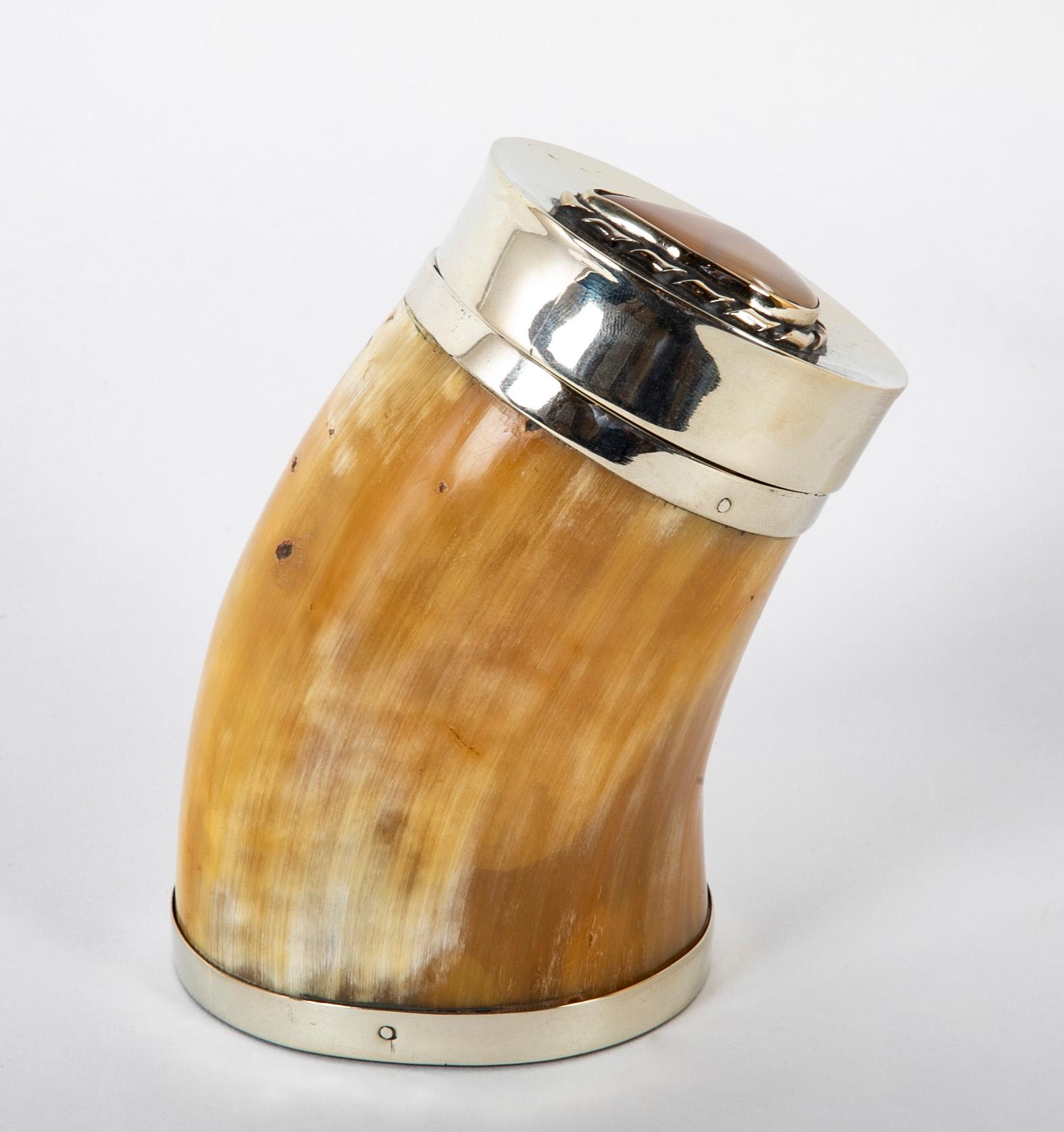 Beautifully made vintage steer horn box by Anthony Redmile. With polished horn body and hand hammered nickle plated brass mounts. The top with an inset framed opal. Signed on bottom 'Redmile Objects, 73 Pimlico Road, London.

Anthony Redmile was