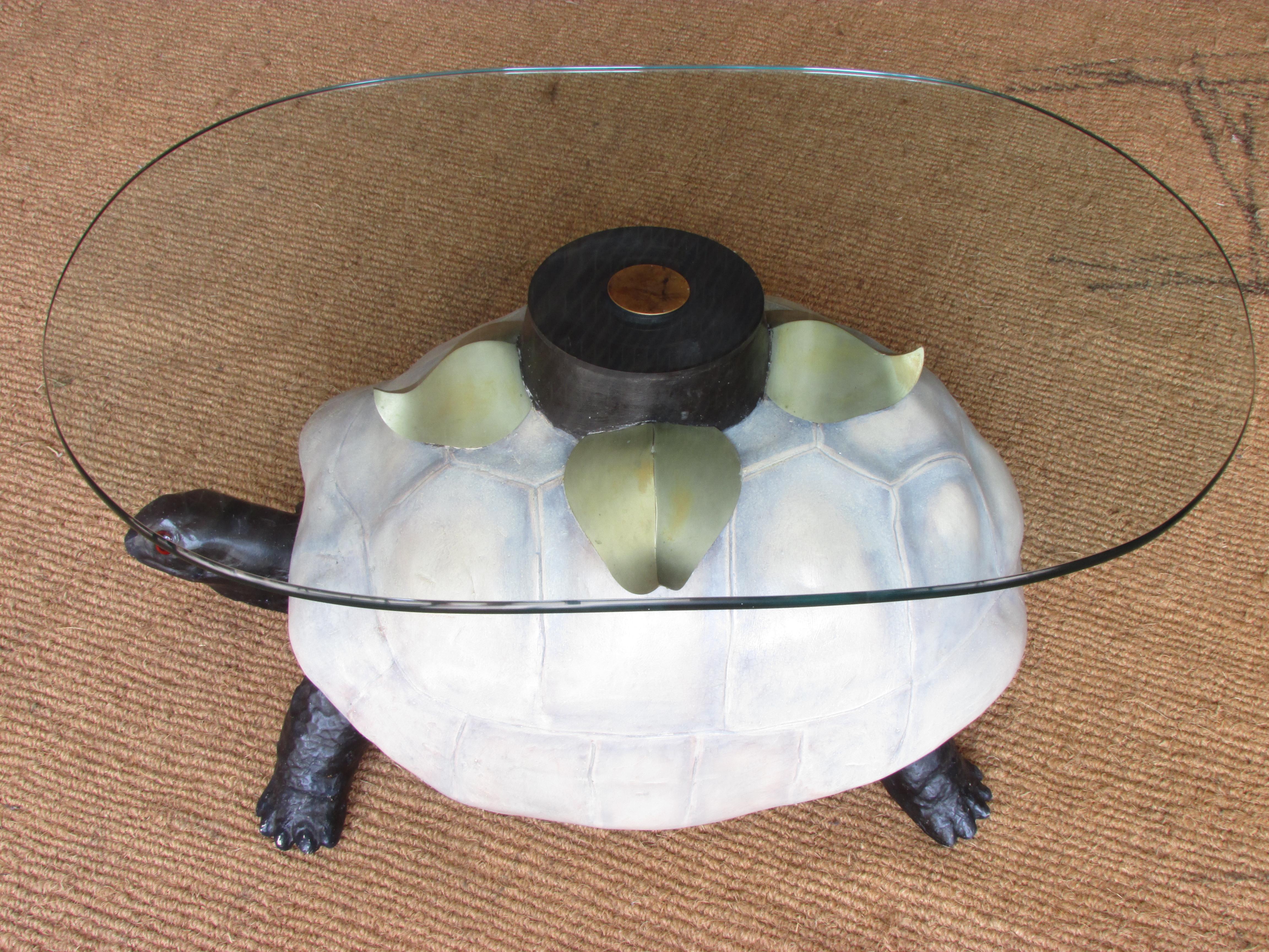 Anthony Redmile style resin tortoise turtle coffee table with oval glass top held in place by inserted bronze disc with attached metal leaves unsigned.