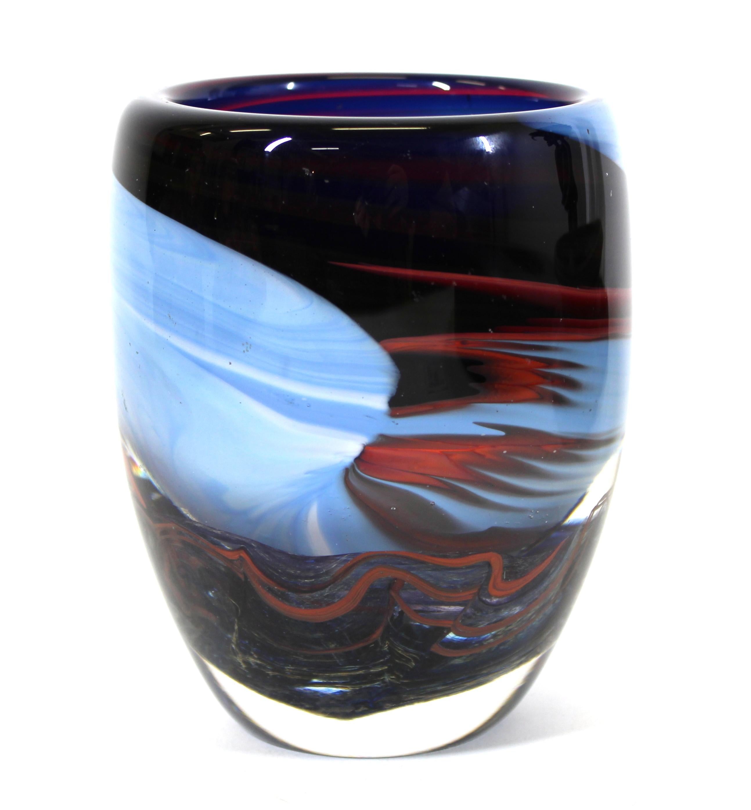 Anthony Stern modern studio art glass vase in multicolored swirls creating a seascape decor. Signed on bottom.