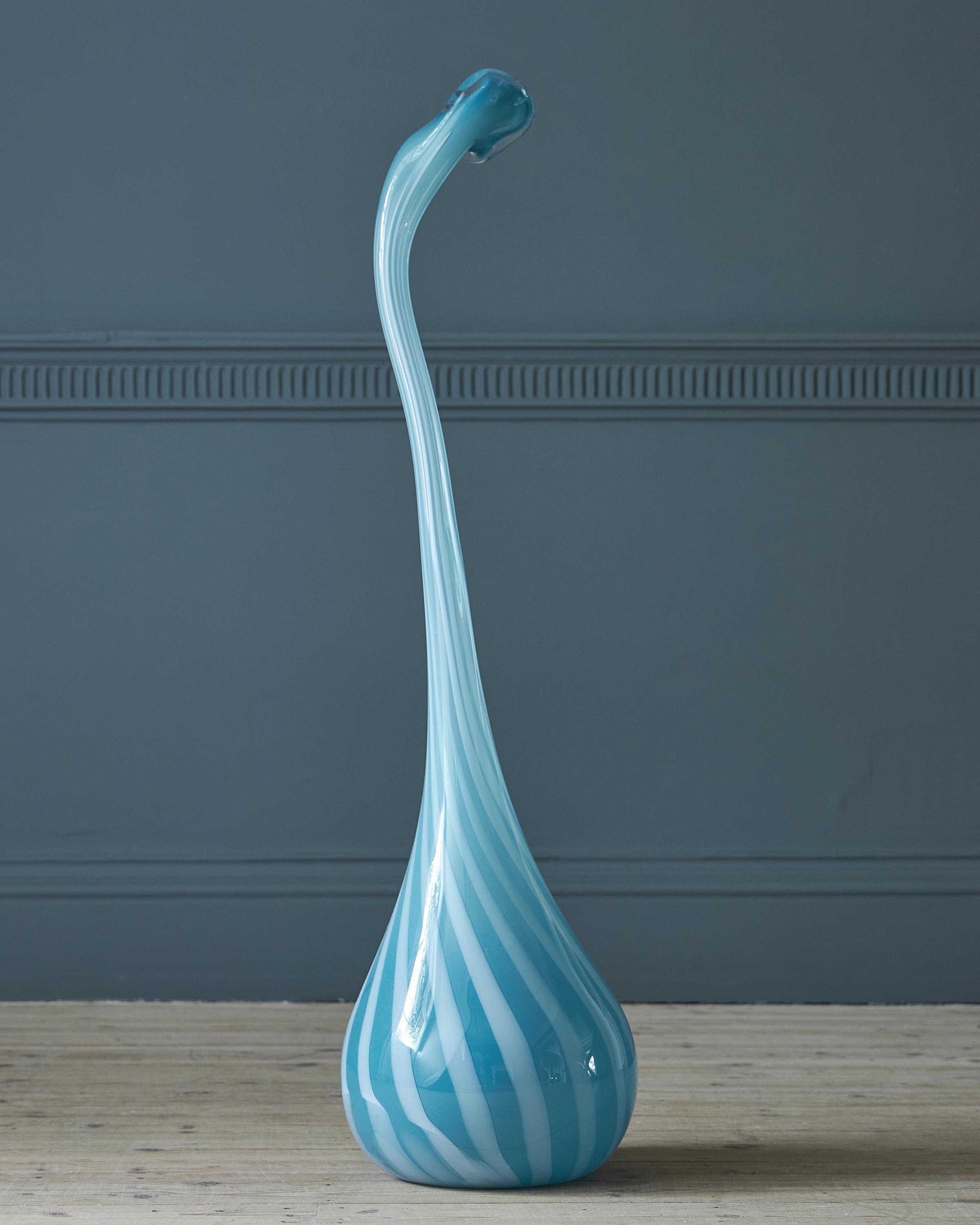 Anthony Stern (British, birth 1944) 

A large twisting glass vase in the form of rose water sprinkler, signed.