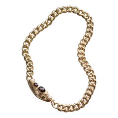 Anthony's Temptation - Halskette oder Wickelarmband aus 9 Karat Gold und Granat mit Schlangenbogen