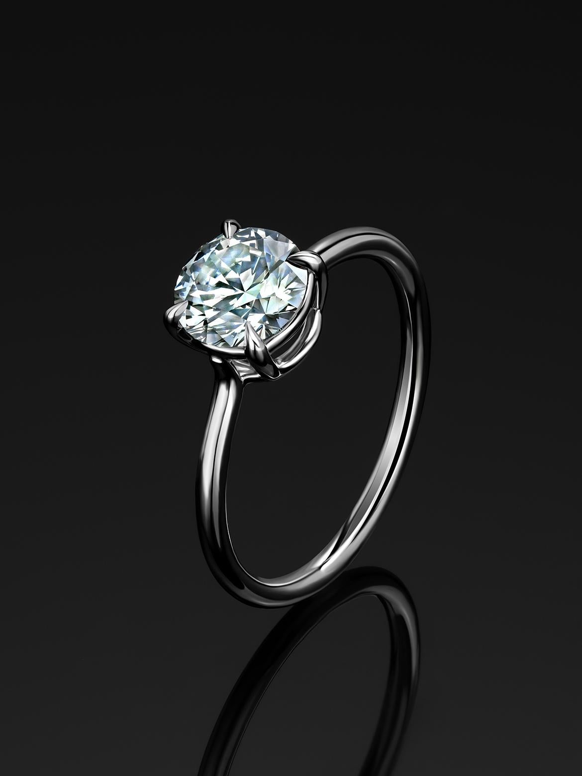 Bague de fiançailles unique en or blanc 18 carats avec diamant gris naturel
taille du diamant -  0.24 in / 6.5 mm
Poids du diamant - 1,02 carats
Poids de l'anneau - 1,9 grammes
Taille de la bague - 5.5 US
La bague est accompagnée d'un rapport sur