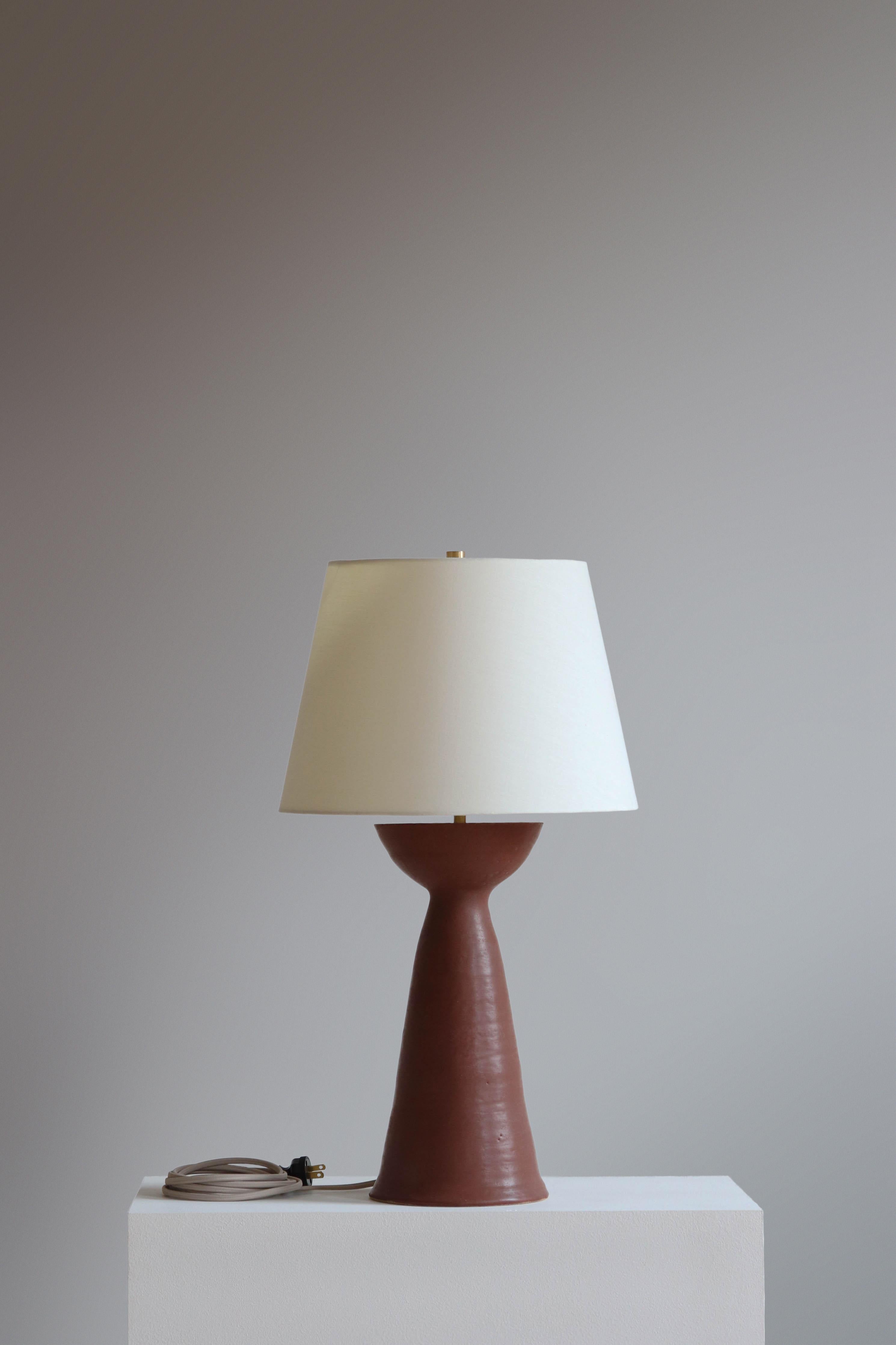Anthracite Seneca 24 Table Lamp by Danny Kaplan Studio
Dimensions: ⌀ 36 x H 61 cm
Materials: Glazed Ceramic, Unfinished Brass, Linen

This item is handmade, and may exhibit variability within the same piece. We do our best to maintain a consistent