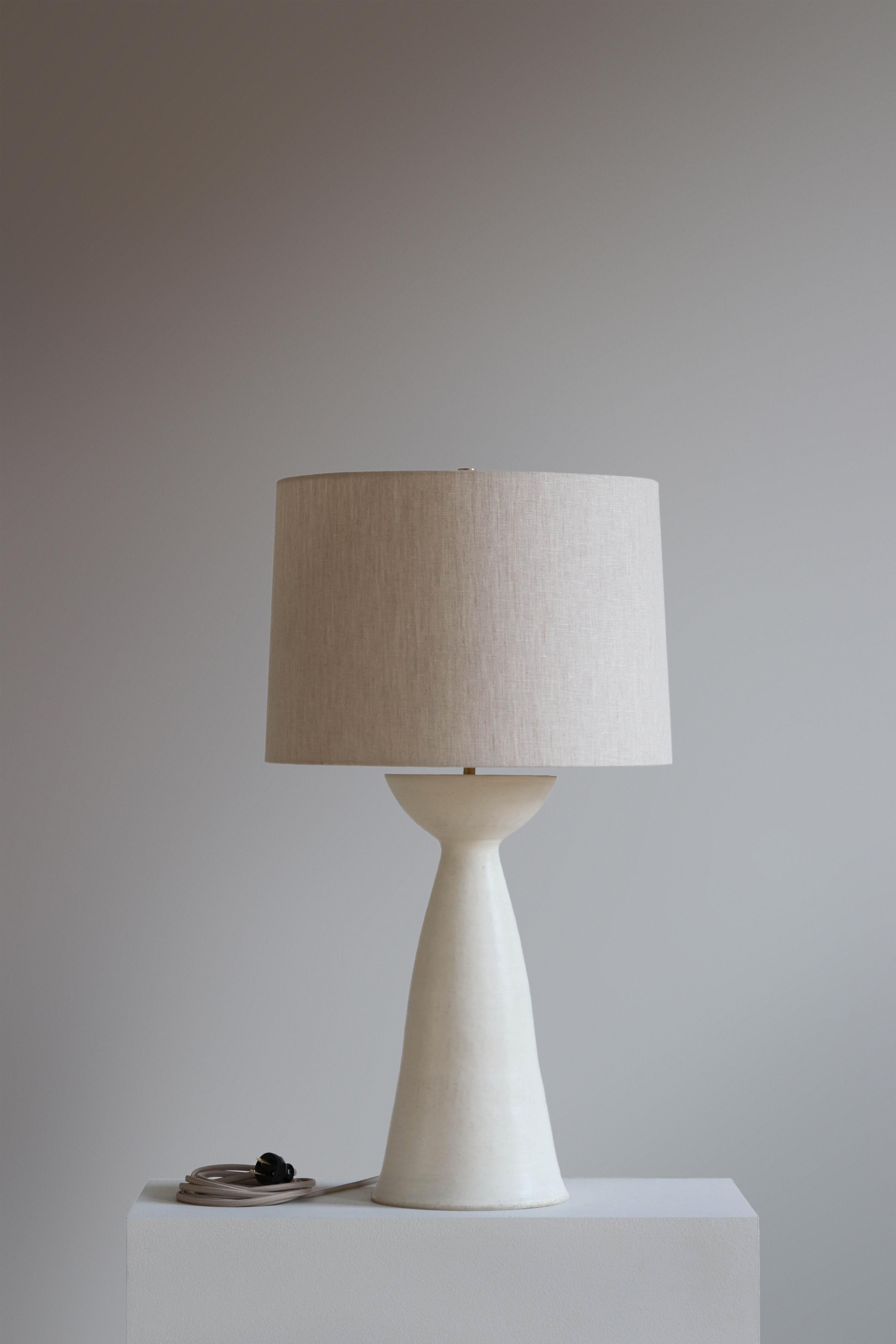 Anthracite Seneca 30 Table Lamp by Danny Kaplan Studio
Dimensions: ⌀ 41 x H 76 cm
Materials: Glazed Ceramic, Unfinished Brass, Linen

This item is handmade, and may exhibit variability within the same piece. We do our best to maintain a consistent