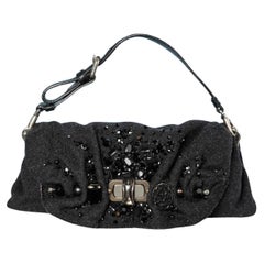Bolso de noche de lana antracita con adorno de cabujones Nina Ricci
