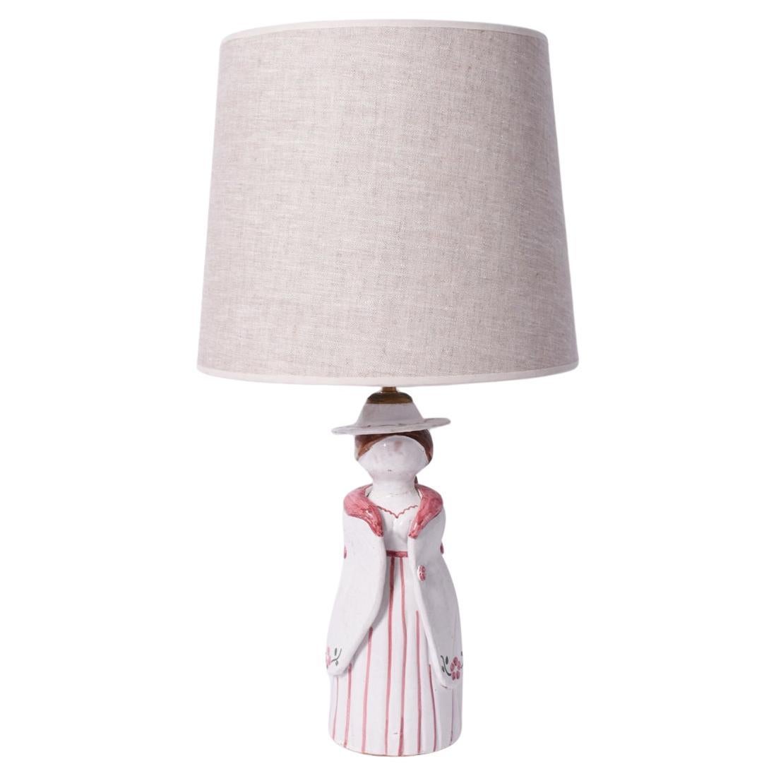 Anthropomorphic ceramic lamp representing a farmer woman. Portugal, 1950s