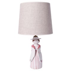 Anthropomorphic ceramic lamp representing a farmer woman. Portugal, 1950s