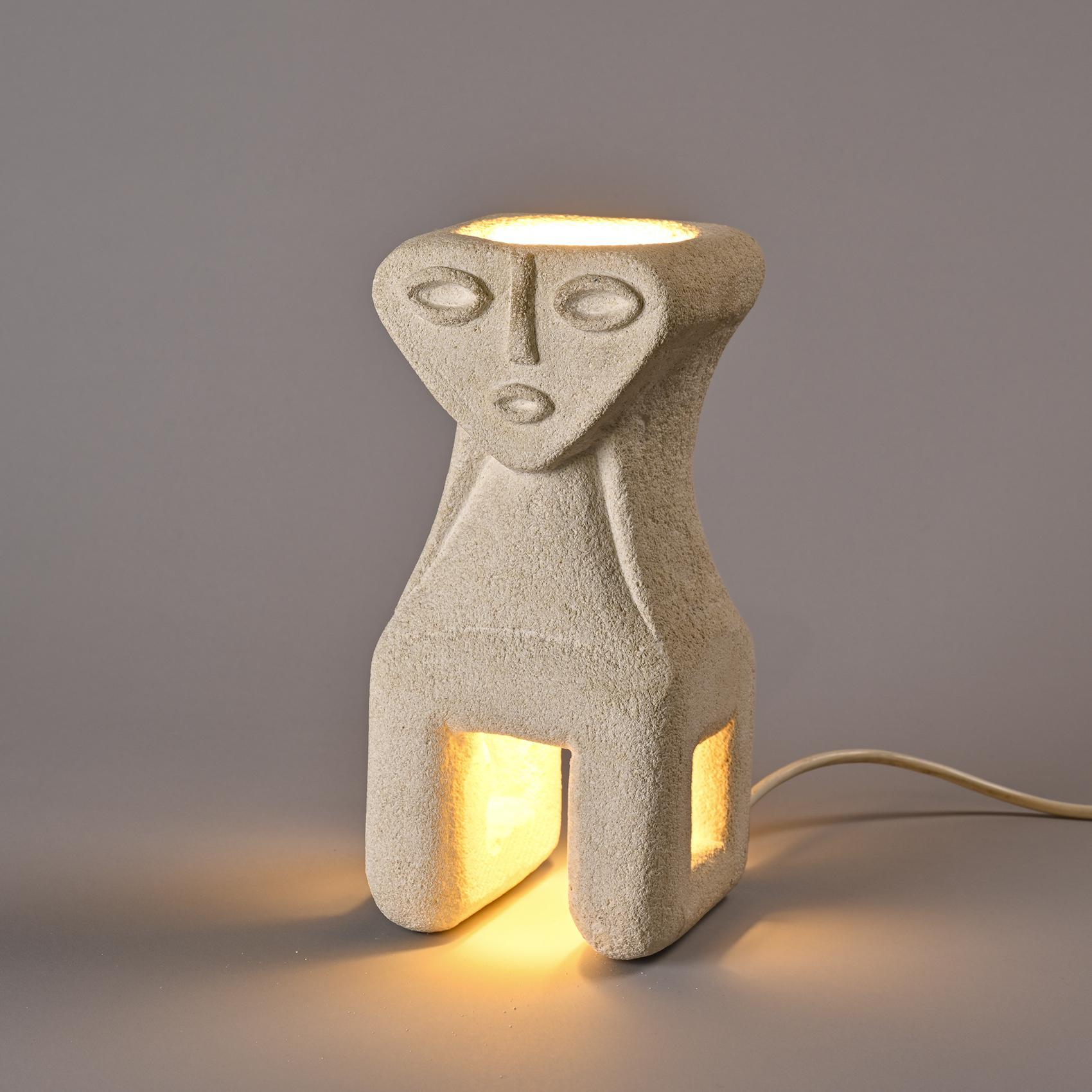 Sculptural anthropomorphic lamp by Albert Tormos, carved in cream Gard stone, circa 1974.

In the 1970s, Albert Tormos developed a singular sculptural language around Gard stone, which he patiently hand-carved to reveal its raw, primitive strength.