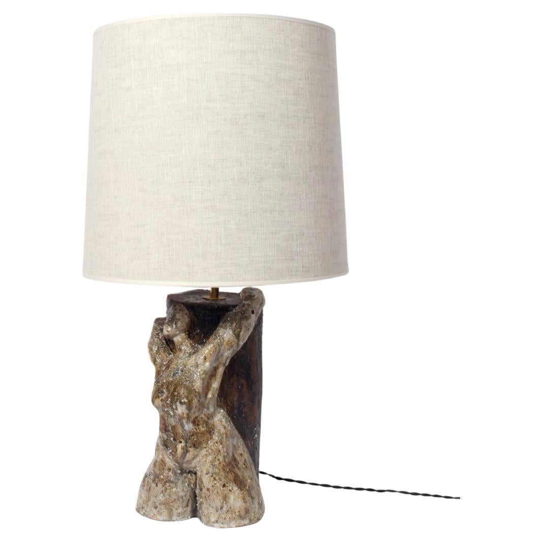 Anthropomorphic lamp representing a woman extending, 2022.