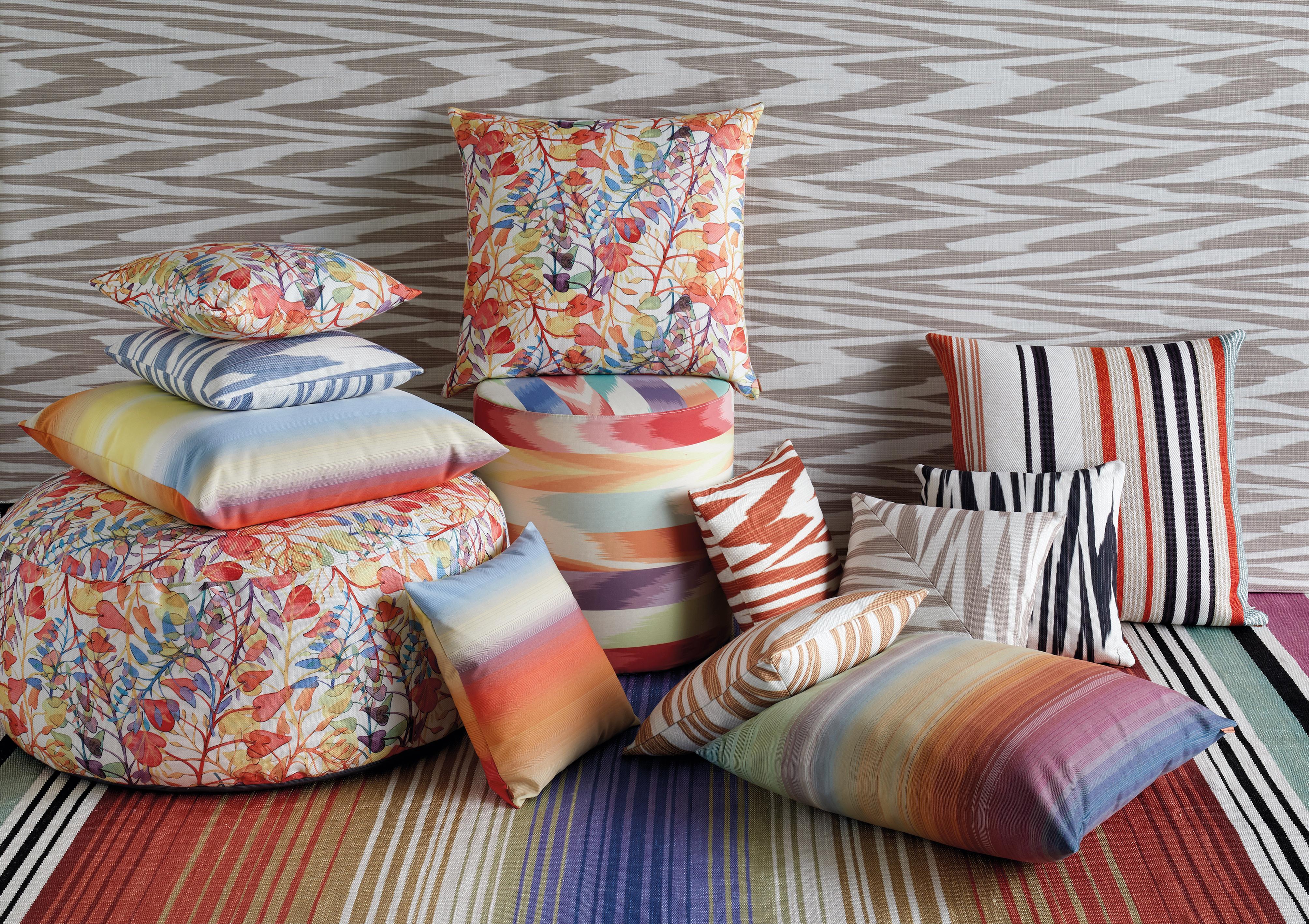 Missoni Home's multi-colored indoor/outdoor cushion with climbing vines on a heavy canvas and removeable cover; poly insert treated for outdoor use.
