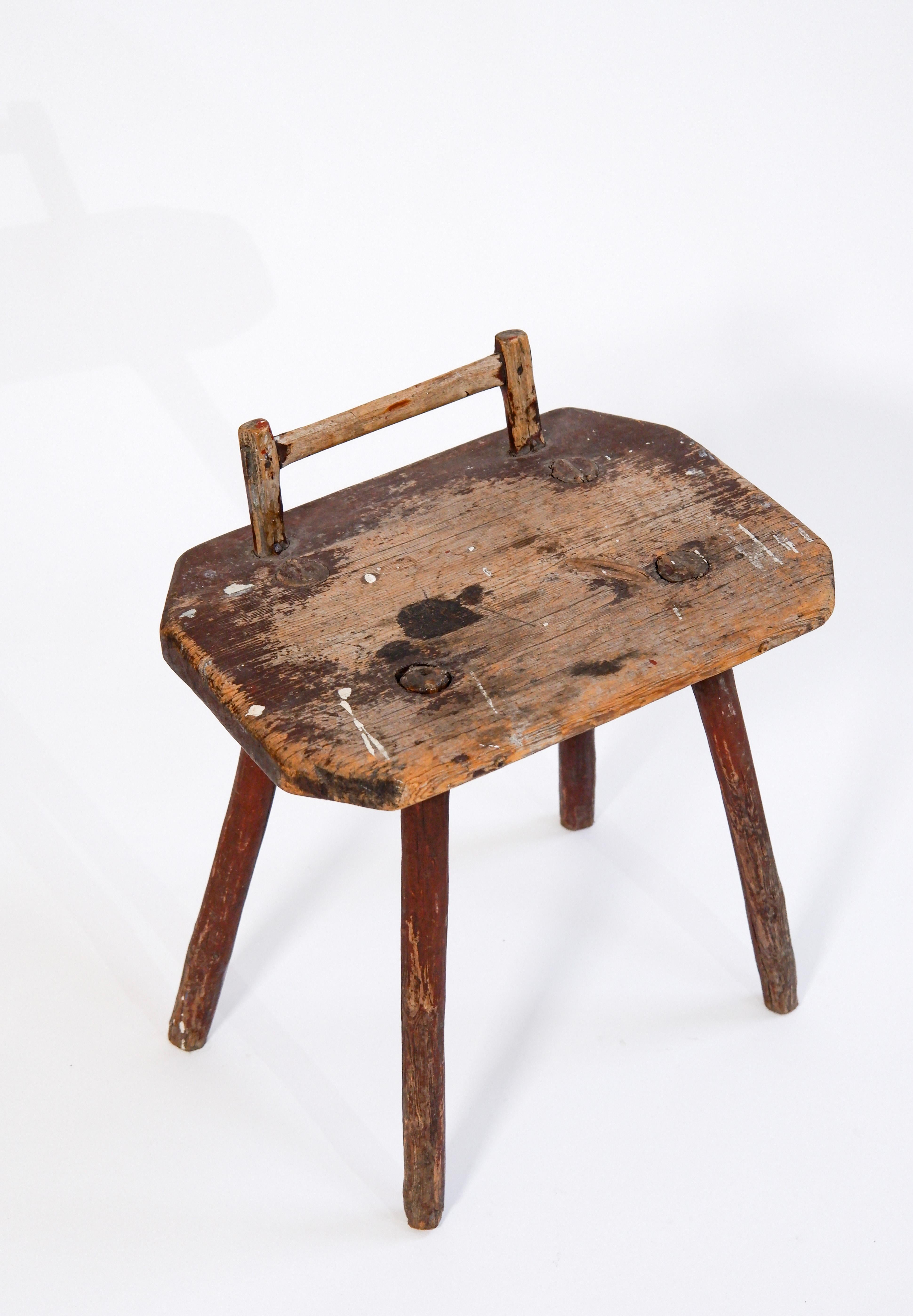 Swedish antic stool with a little high back, the stool has been probably made in the late XIX ème century. The stool has a strong patina but the stability is good. A foot has been glue back. This swedish antic berger style has inspired many later