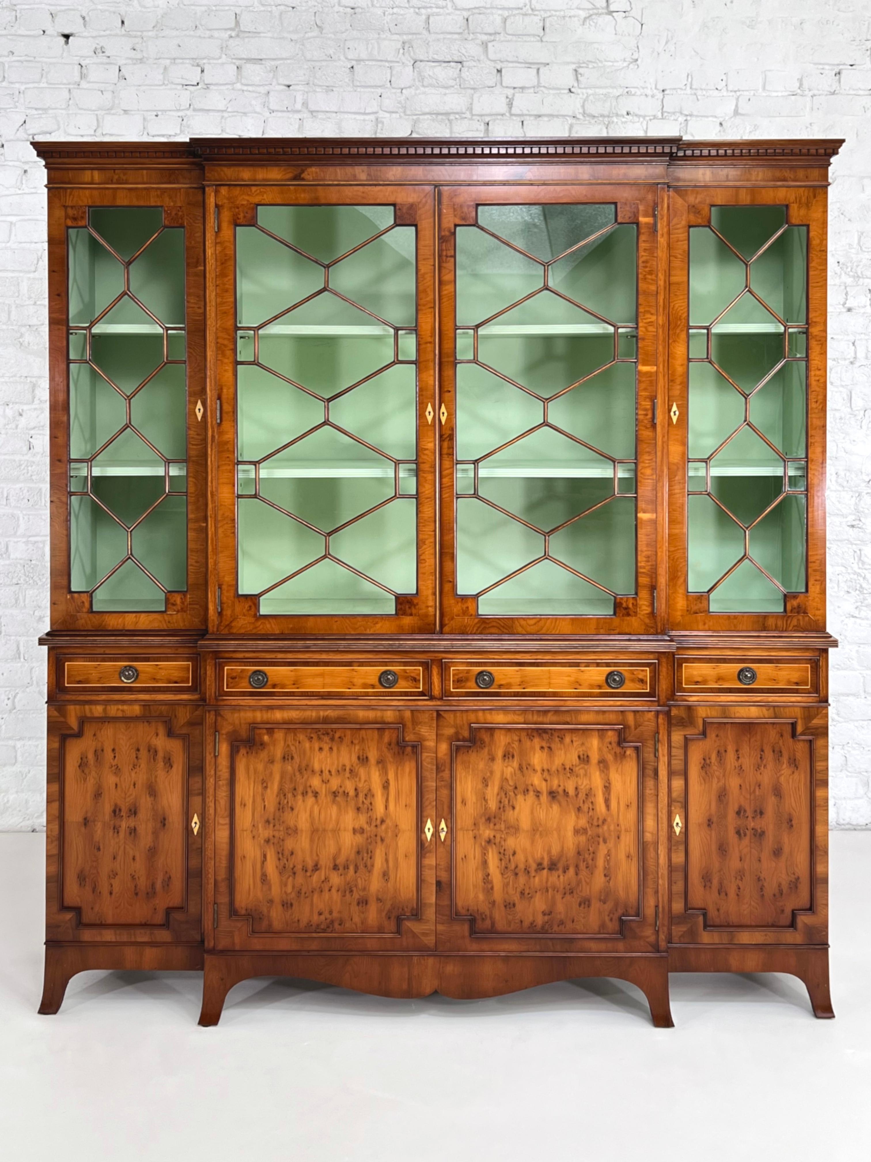 Antic Wooden And Glass Bookcase Storage And Vitrine Cabinet composed of 2 parts:

Up one with storage spaces, 4 graphic glass panel doors with sculpted finishes and almond green lacquered inside
Bottom one with closed spaces, 4 drawers with