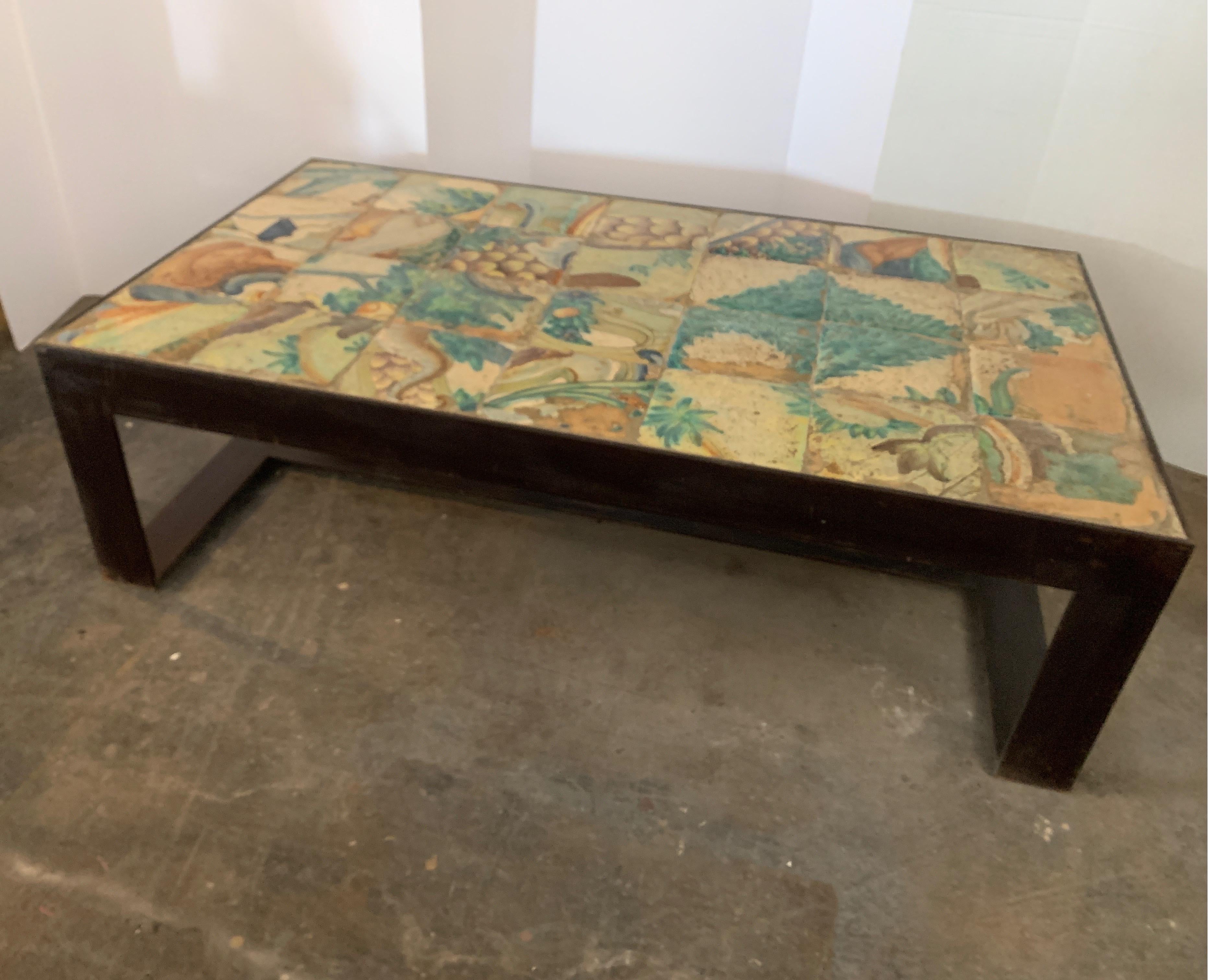 These tiles from Portugal are beautiful colors that we had set into an forged iron coffee table. It's perfect for outdoors or in. It's very heavy so once in place not going anywhere.
