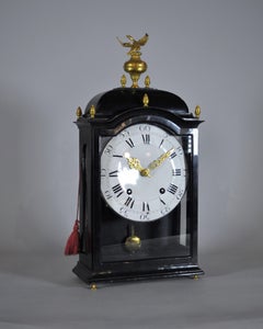 Antique Swiss wooden clock with gilt eagle, chime, 1750s era.