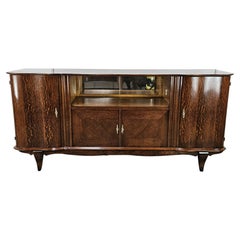 Antique Art Deco 1950s oak sideboard with sliding glass and decorations