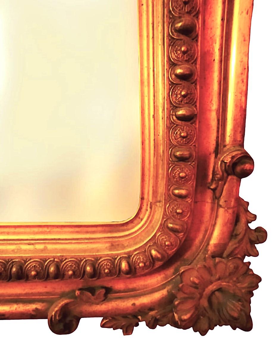 Miroir ancien doré et décoré d'époque ombertine (vers 1880)
Miroir méca-doré à décor de stucs ornant le cadre de motifs floraux et de rinceaux.
À restaurer
Dimensions : H. cm 150 - L. cm 88 - P. cm 10

Si vous avez des questions ou si vous souhaitez