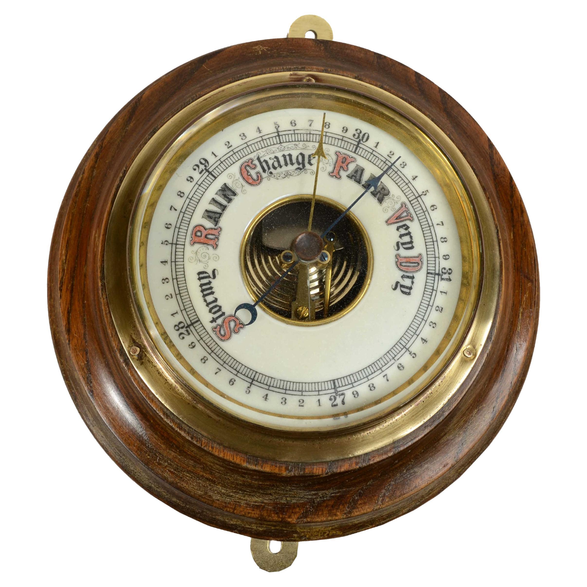 Antique English aneroid barometer from the 1930s made of turned wood and brass   For Sale