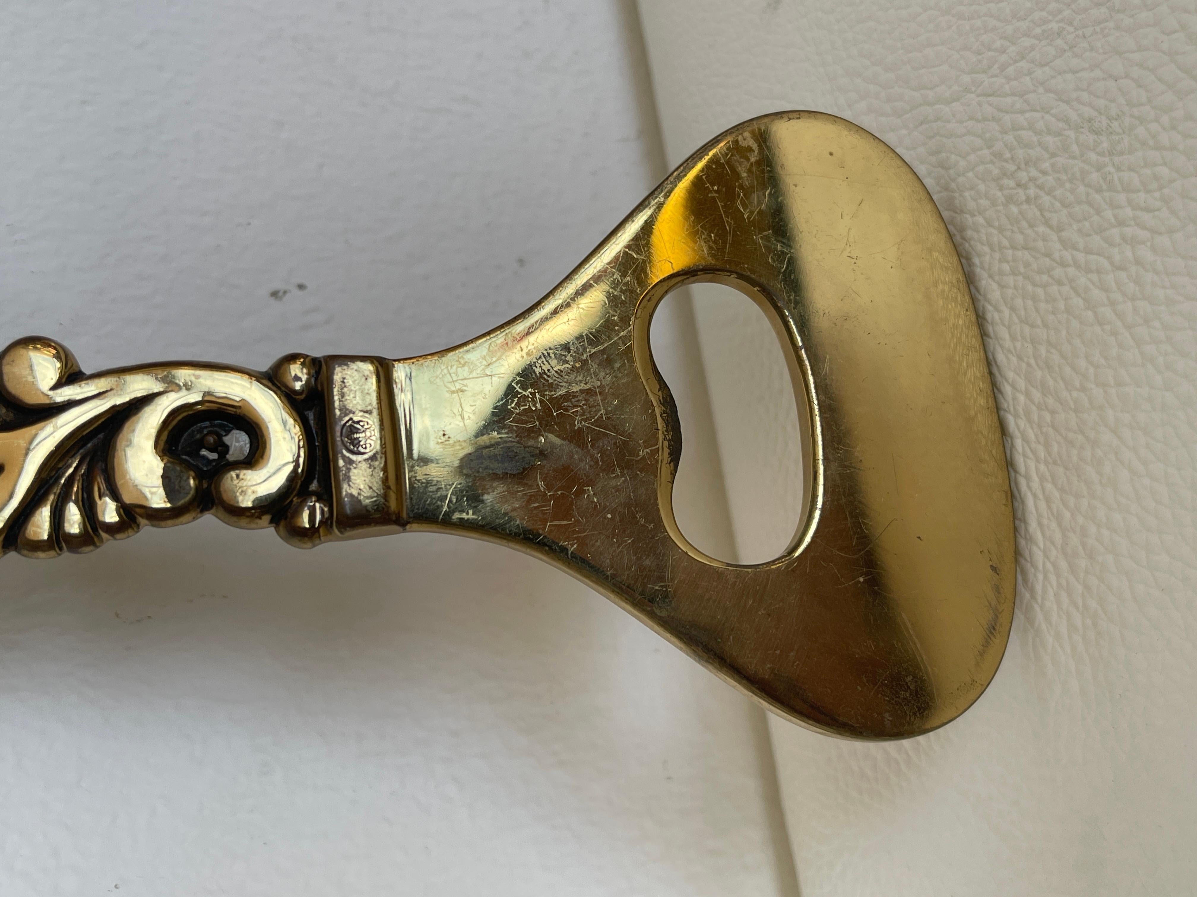 Antico cavatappi italiano in bronzo dorato 1930 Italian en venta