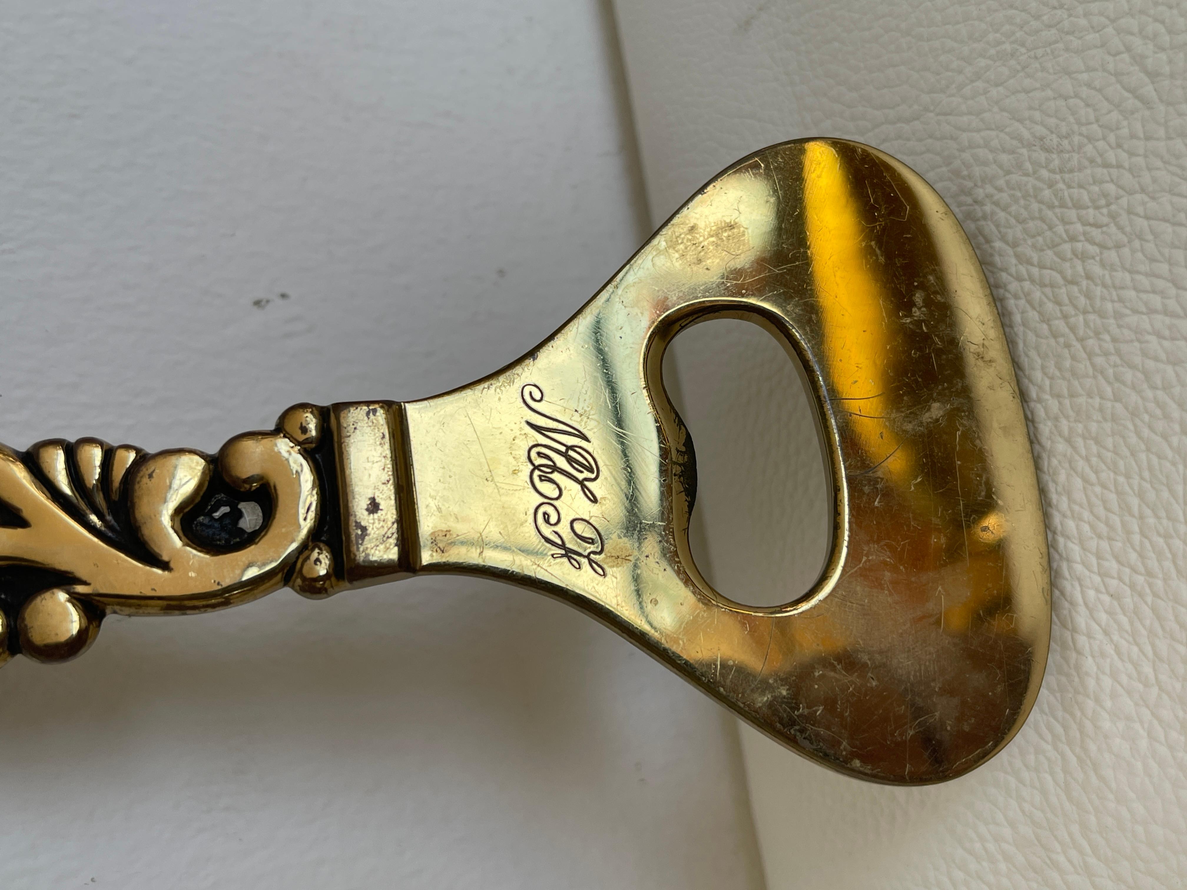 Antico cavatappi italiano in bronzo dorato 1930 Hecho a mano en venta