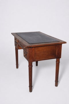 Antique Italian writing desk in the Victorian English style with a faux-leather top