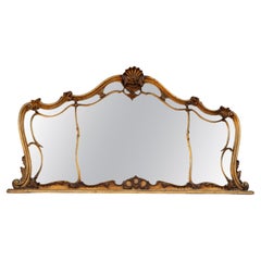 Miroir ancien sculpté et doré, 1900