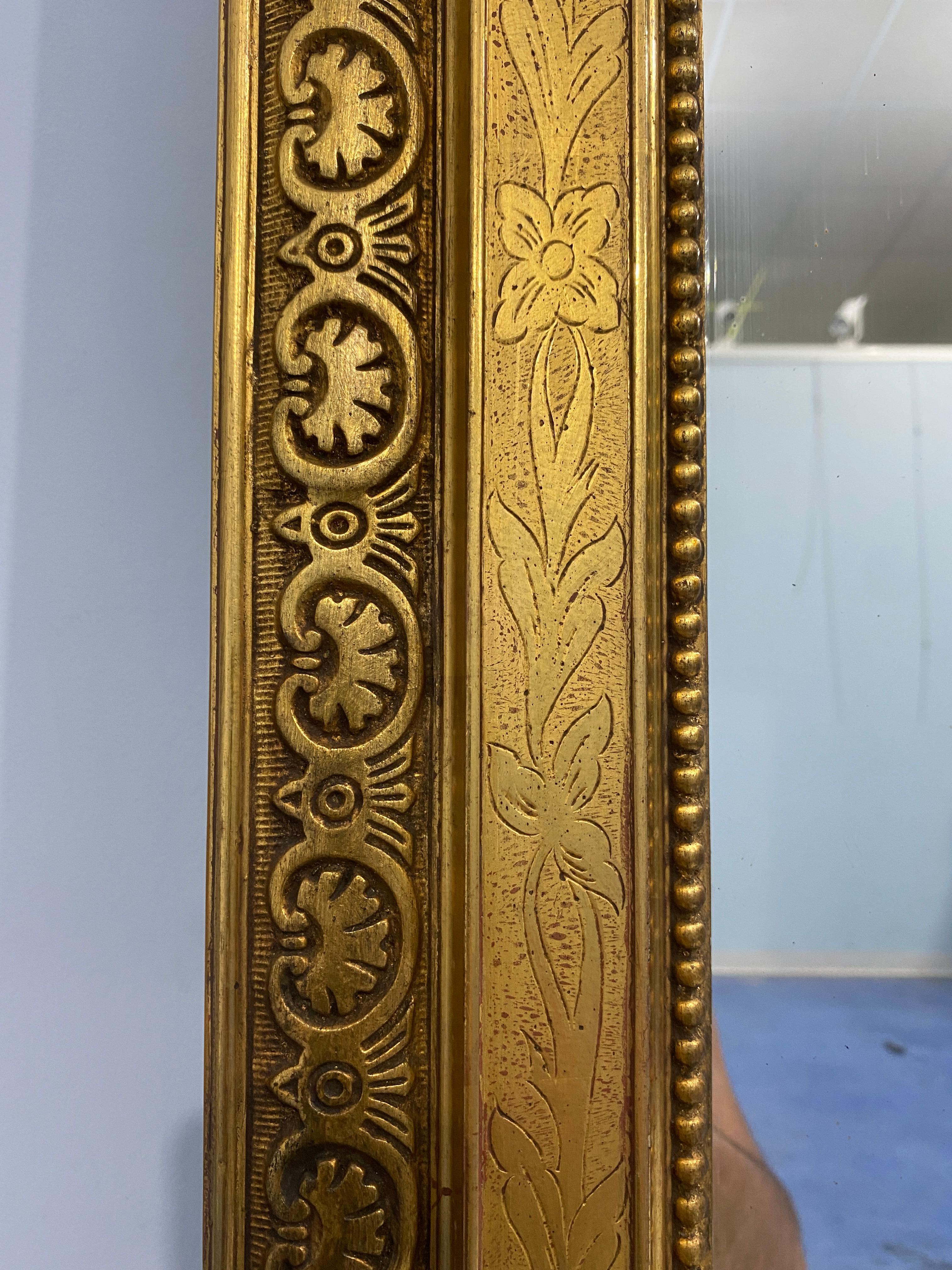 Gesso Antique French gilt mirror  gold leaf with Louis Philippe era selvedge For Sale