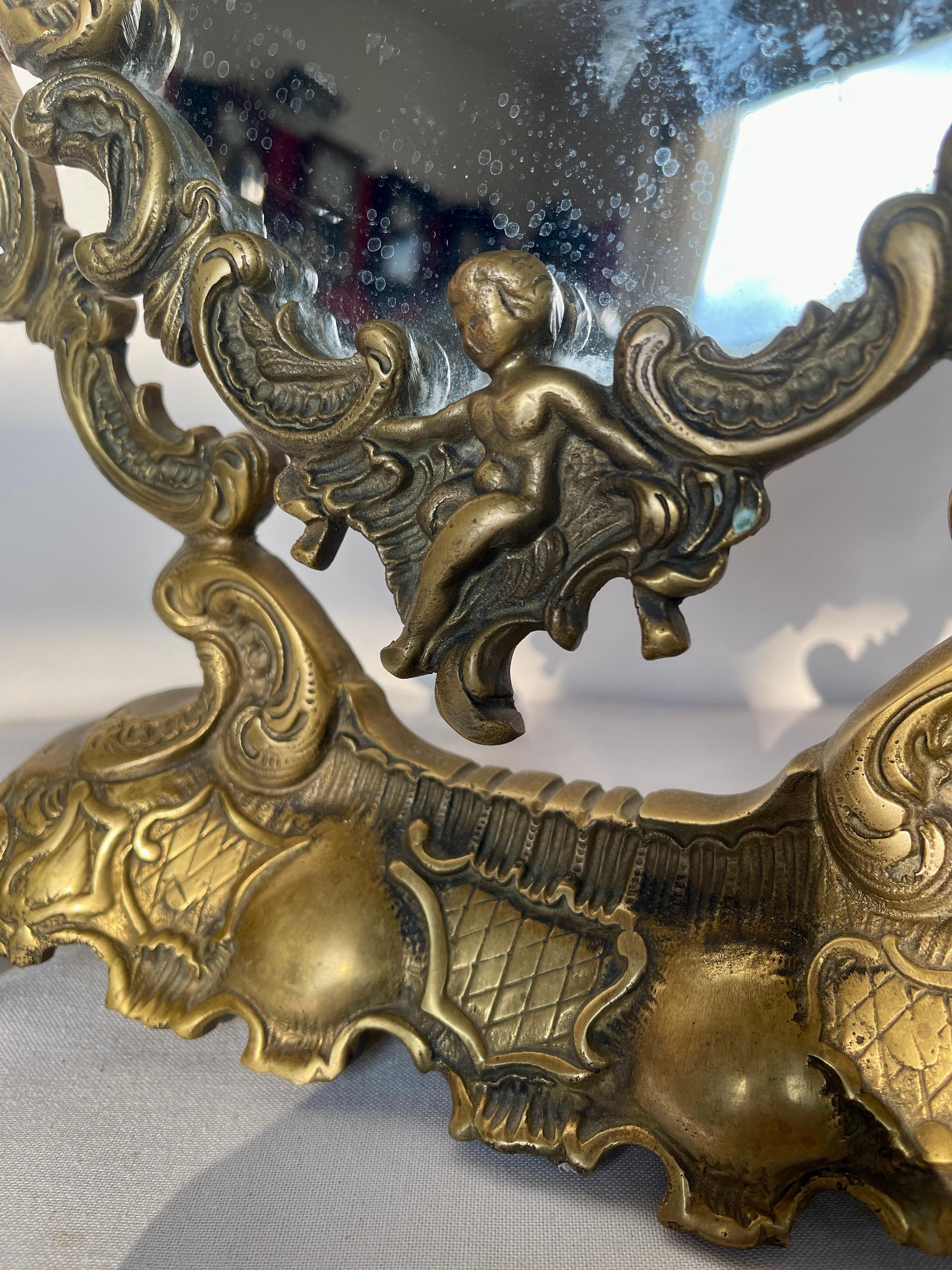 20th Century Miroir ancien en bronze avec ange 1930 en vente
