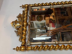 Antique wooden mirror in twisted style late 19th century